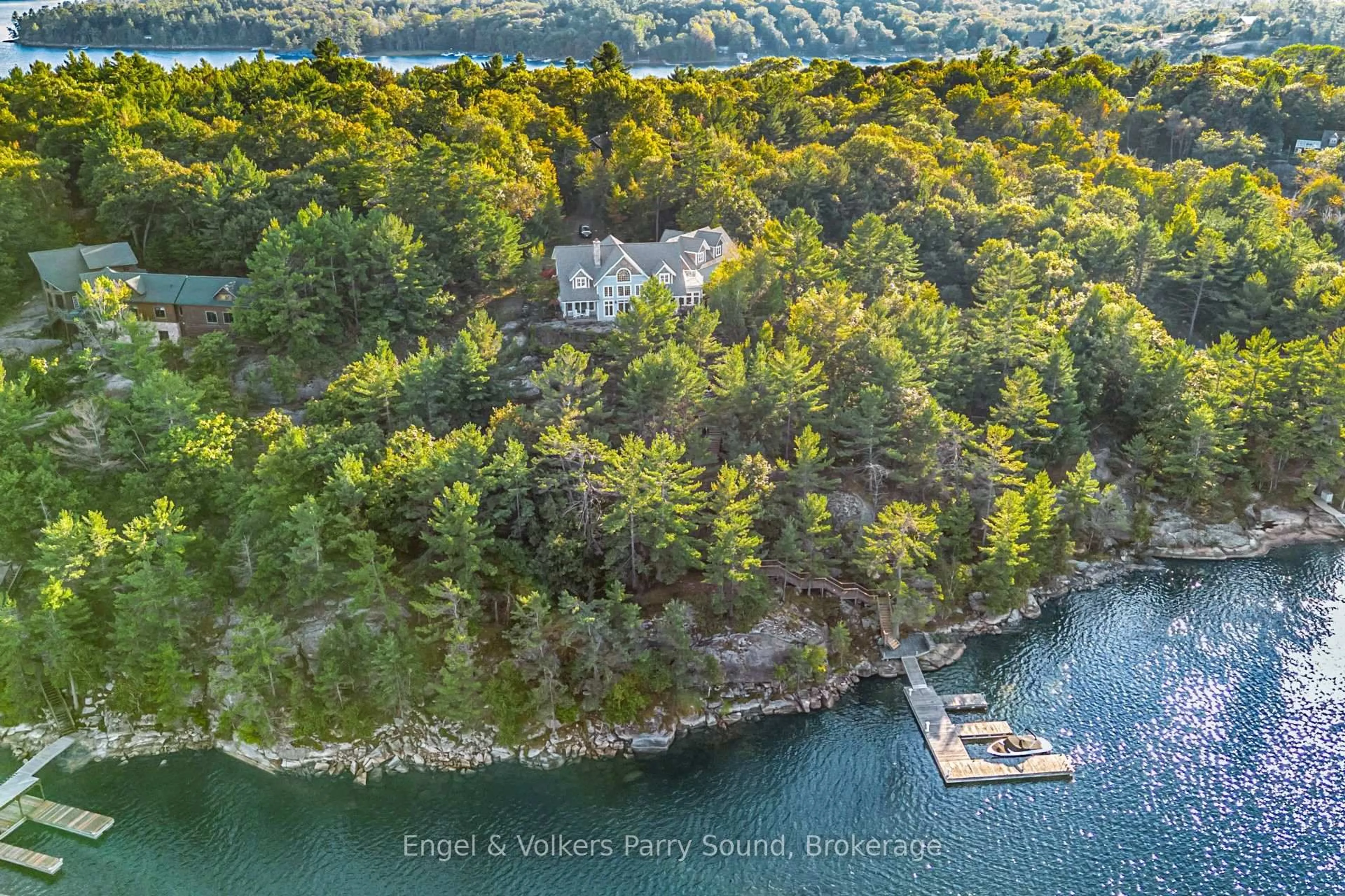 A pic from outside/outdoor area/front of a property/back of a property/a pic from drone, water/lake/river/ocean view for 22 Beacon Point Dr, Carling Ontario P0G 1G0