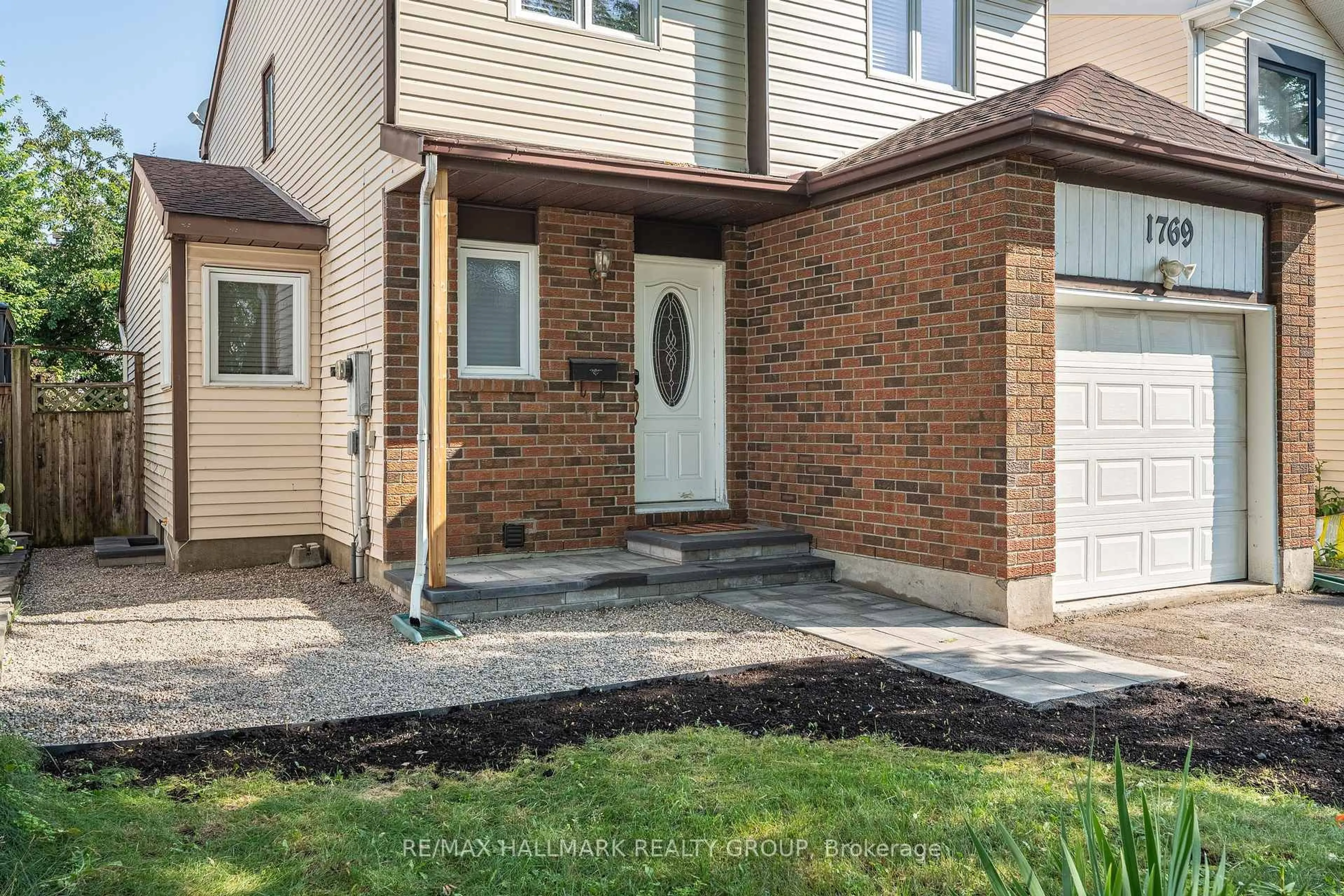 Home with brick exterior material, street for 1769 Bromont Way, Ottawa Ontario K1C 5K1