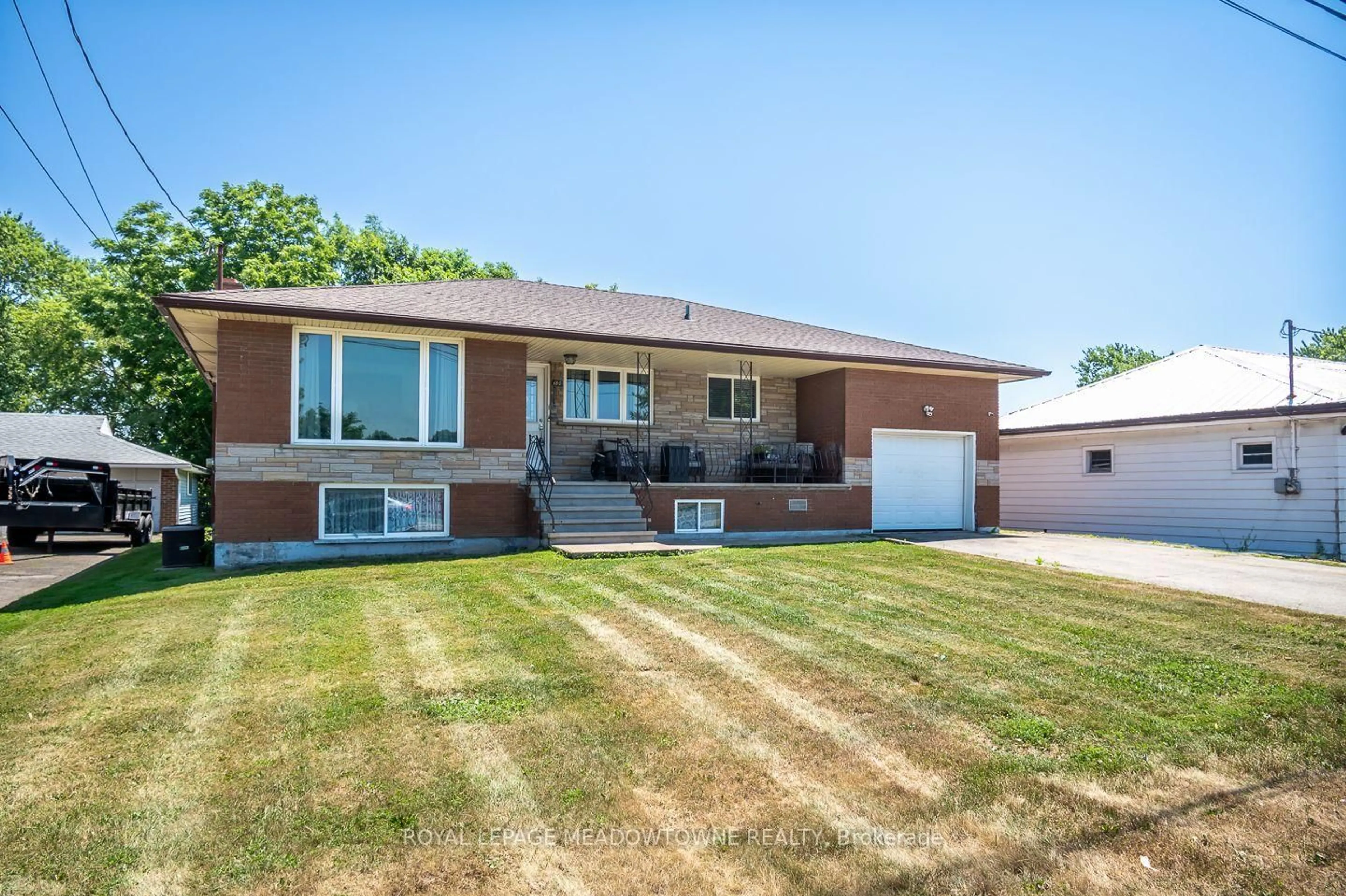 Home with brick exterior material, street for 180 West Side Rd, Port Colborne Ontario L3K 5K7