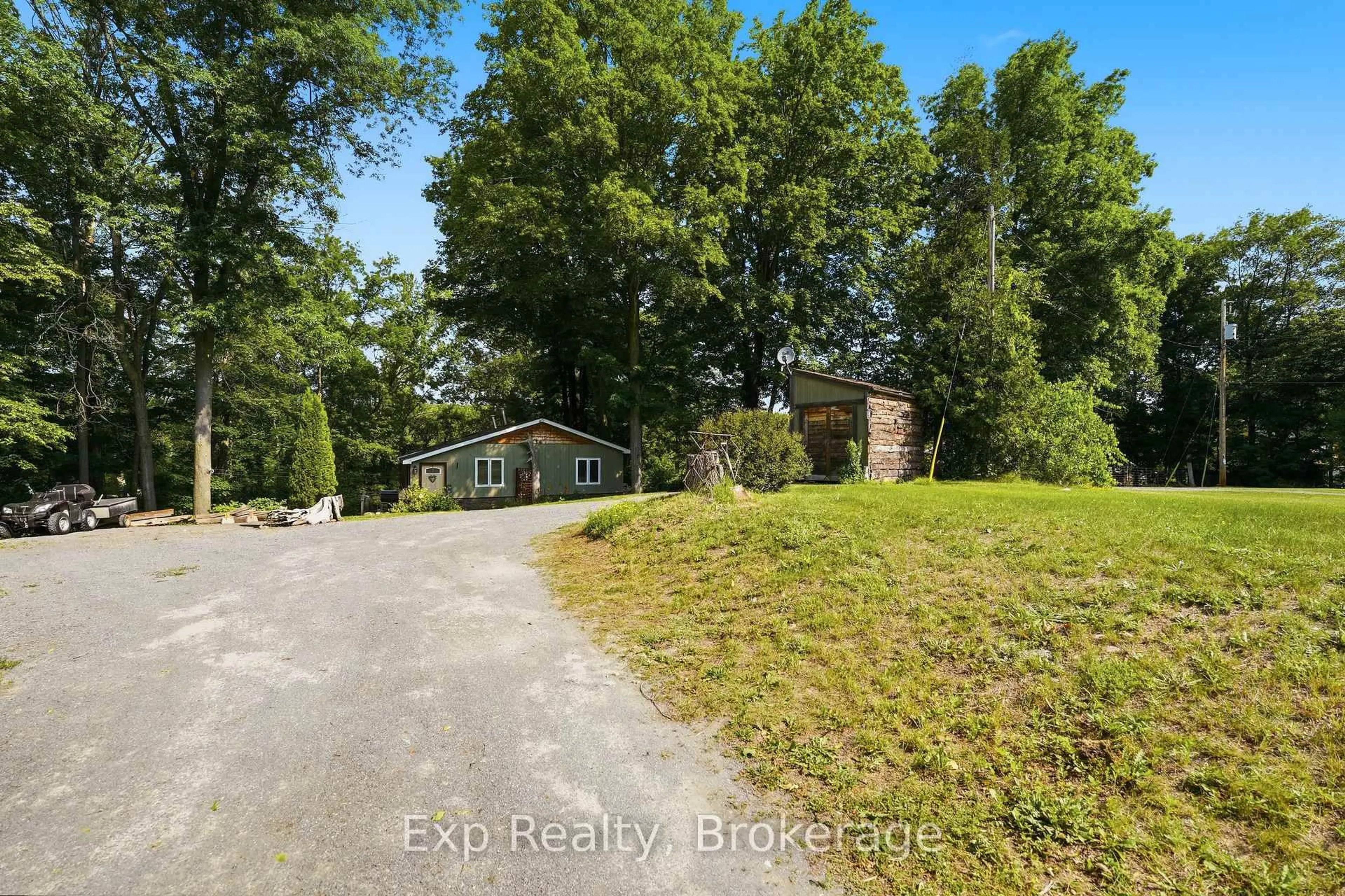 A pic from outside/outdoor area/front of a property/back of a property/a pic from drone, water/lake/river/ocean view for 131 Cottage Lane, Belleville Ontario K0K 2V0