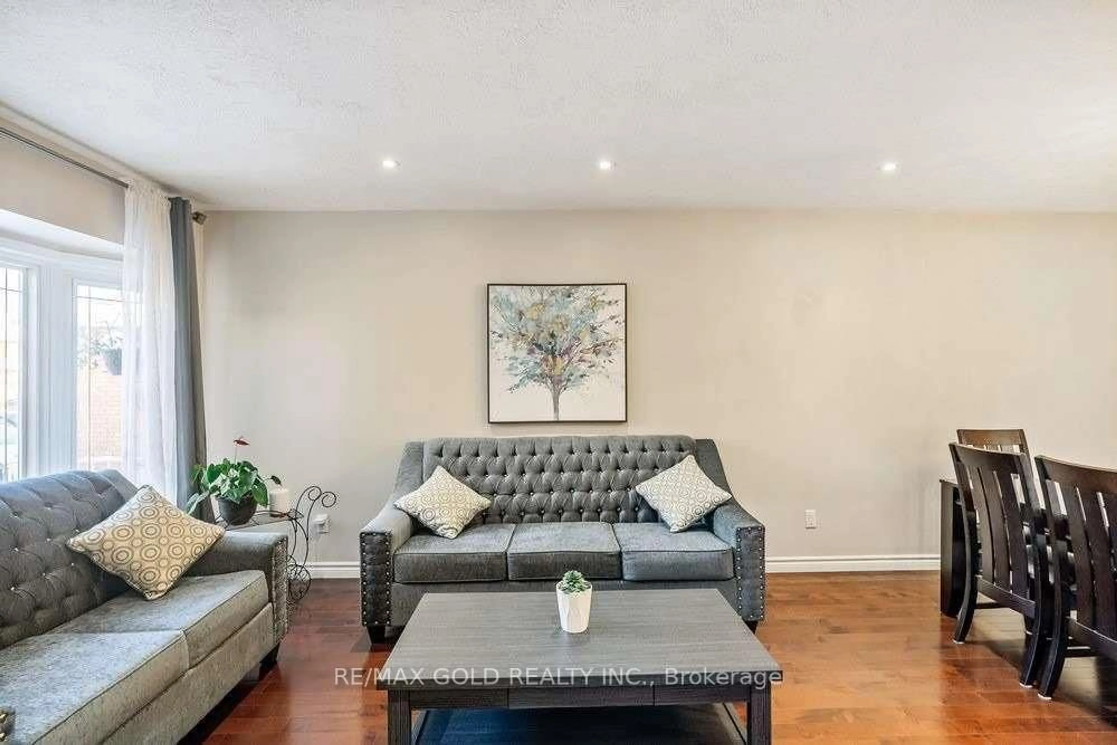 Living room with furniture, wood/laminate floor for 573 Burnett Ave, Cambridge Ontario N1T 1M6