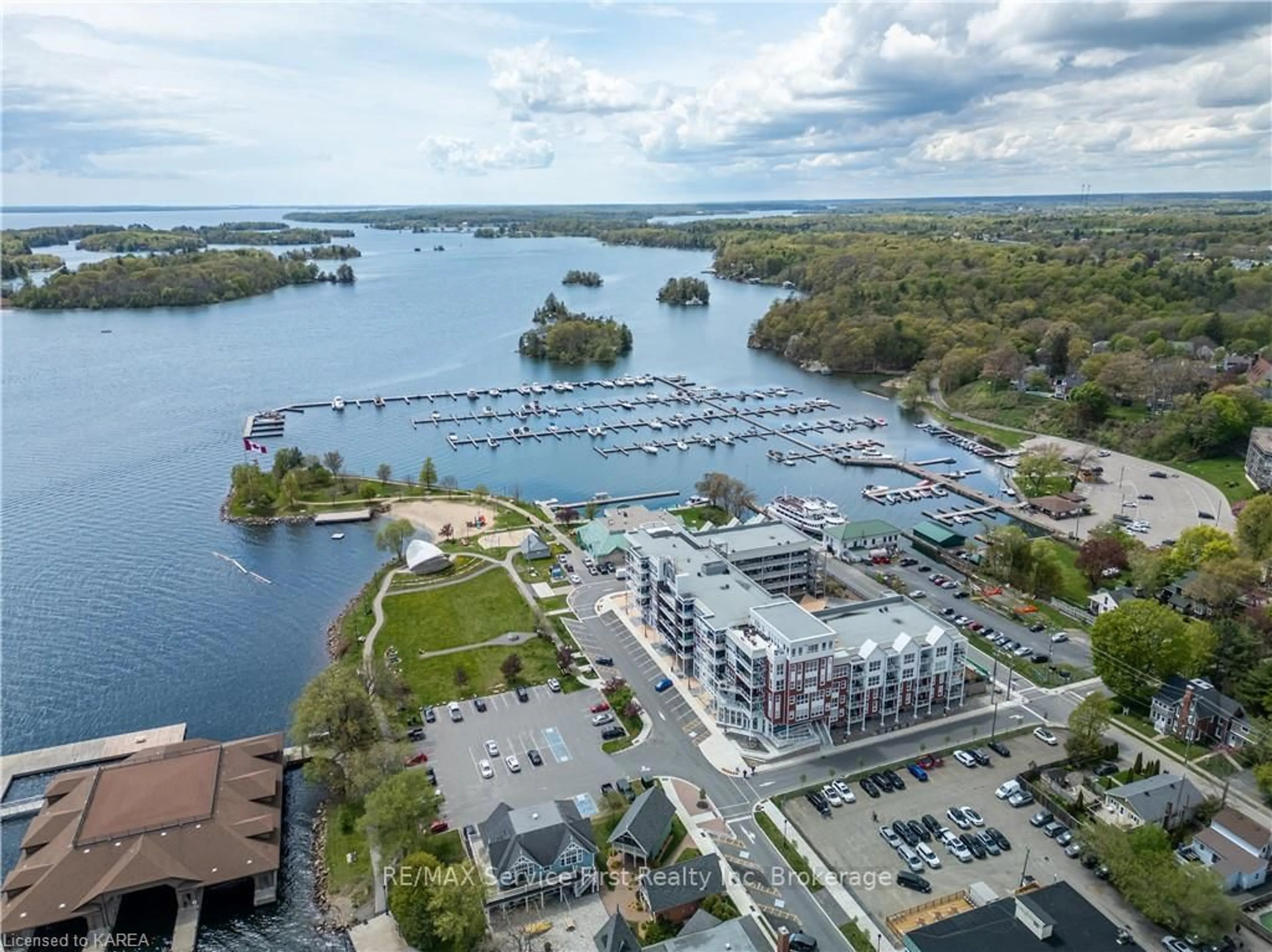 A pic from outside/outdoor area/front of a property/back of a property/a pic from drone, water/lake/river/ocean view for 130 WATER St #206, Gananoque Ontario K7G 2C4