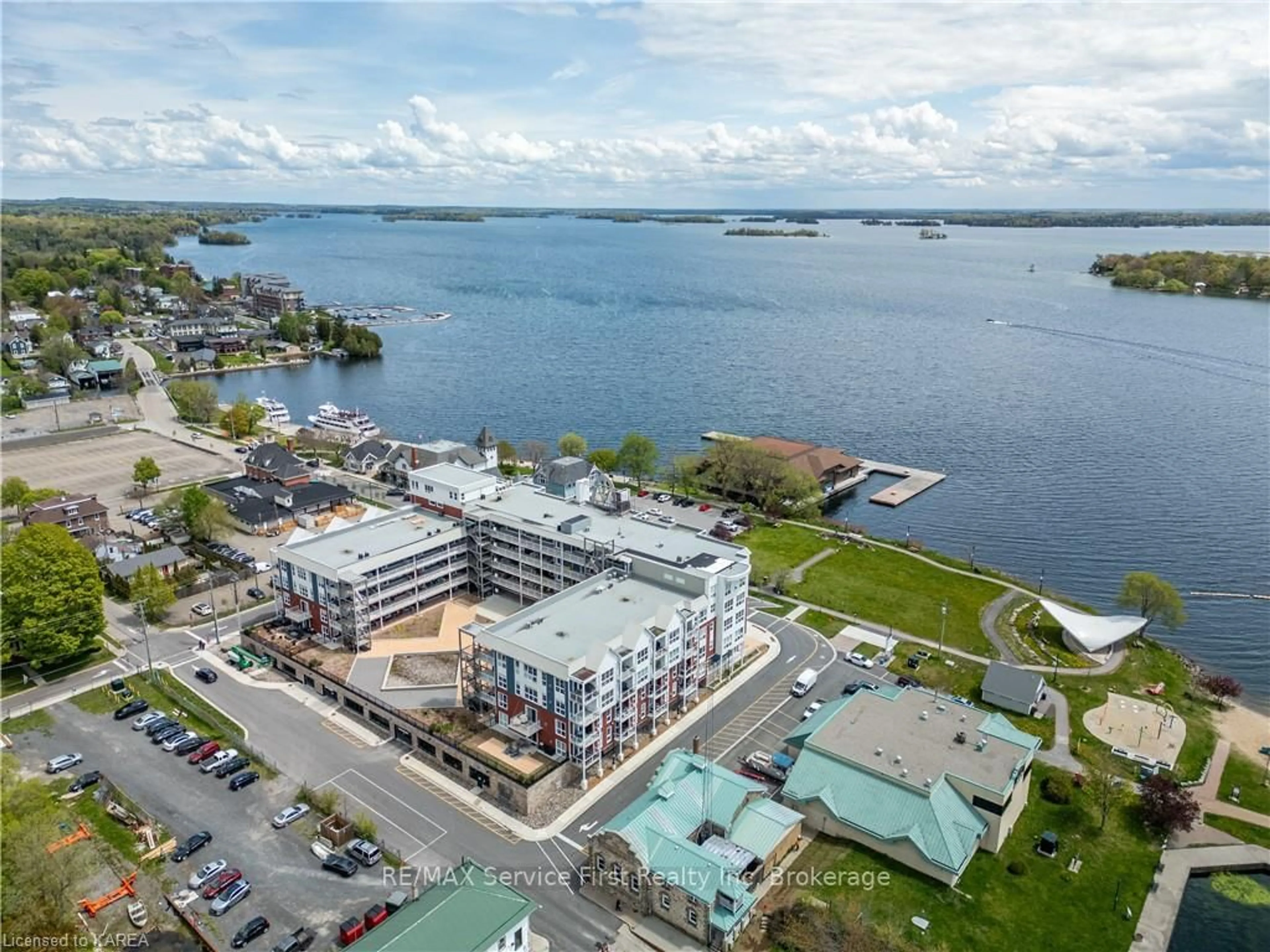 A pic from outside/outdoor area/front of a property/back of a property/a pic from drone, water/lake/river/ocean view for 130 WATER St #206, Gananoque Ontario K7G 2C4