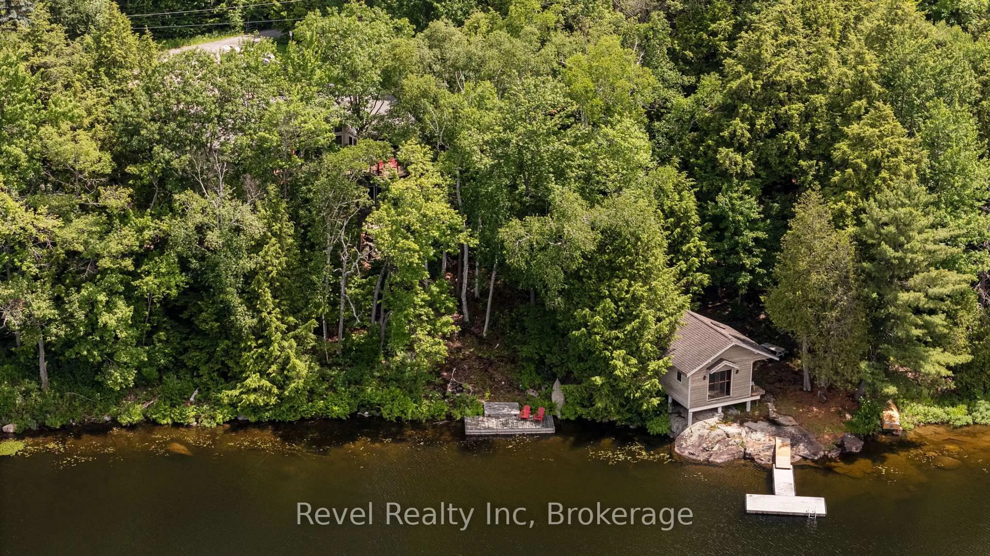 A pic from outside/outdoor area/front of a property/back of a property/a pic from drone, water/lake/river/ocean view for 30 Sparrow Rd, Seguin Ontario P0C 1J0