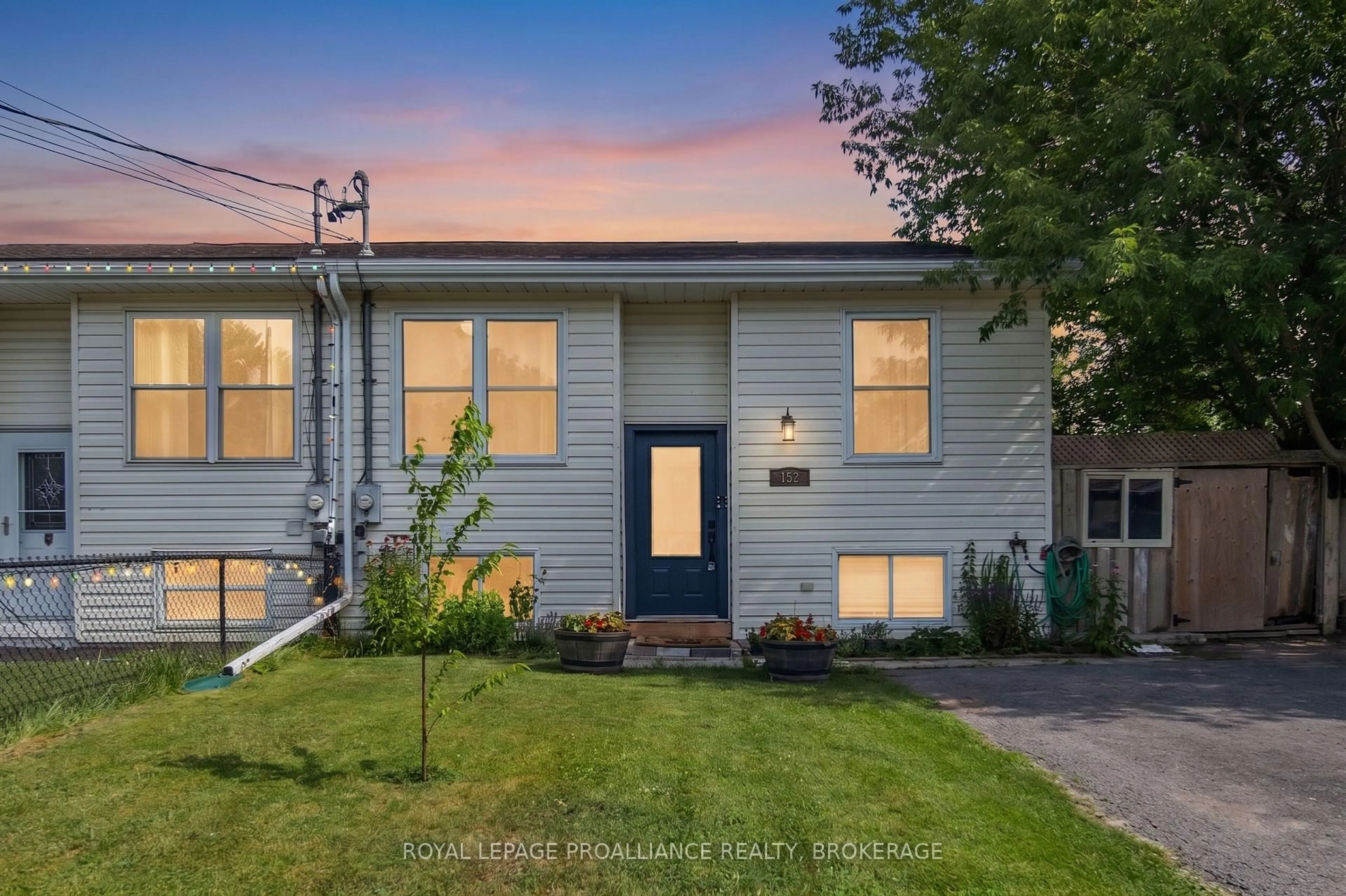 Home with vinyl exterior material, street for 152 Purdy Rd, Bath Ontario K0H 1G0