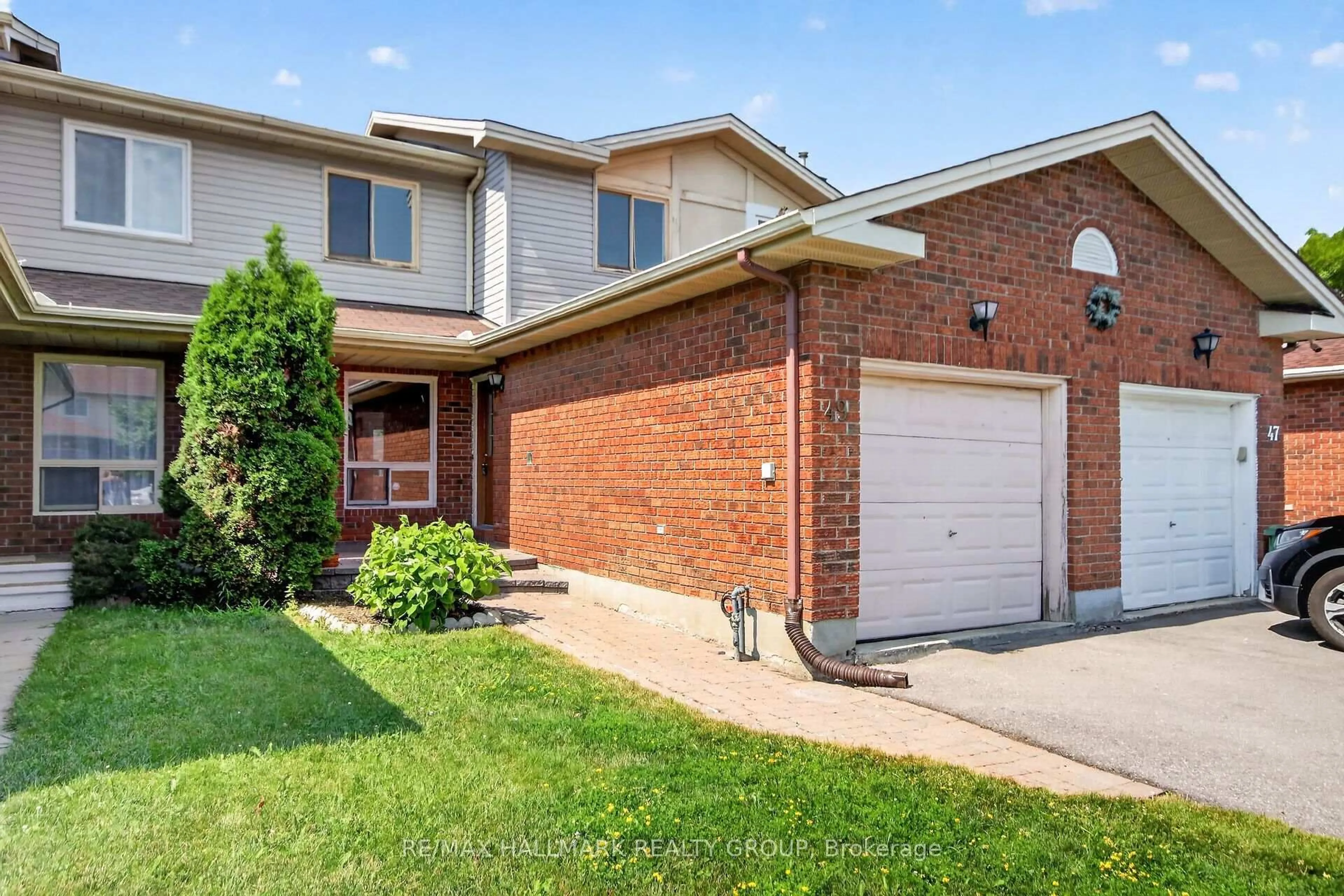 Home with brick exterior material, street for 49 Newport Cres, Ottawa Ontario K1T 3M2