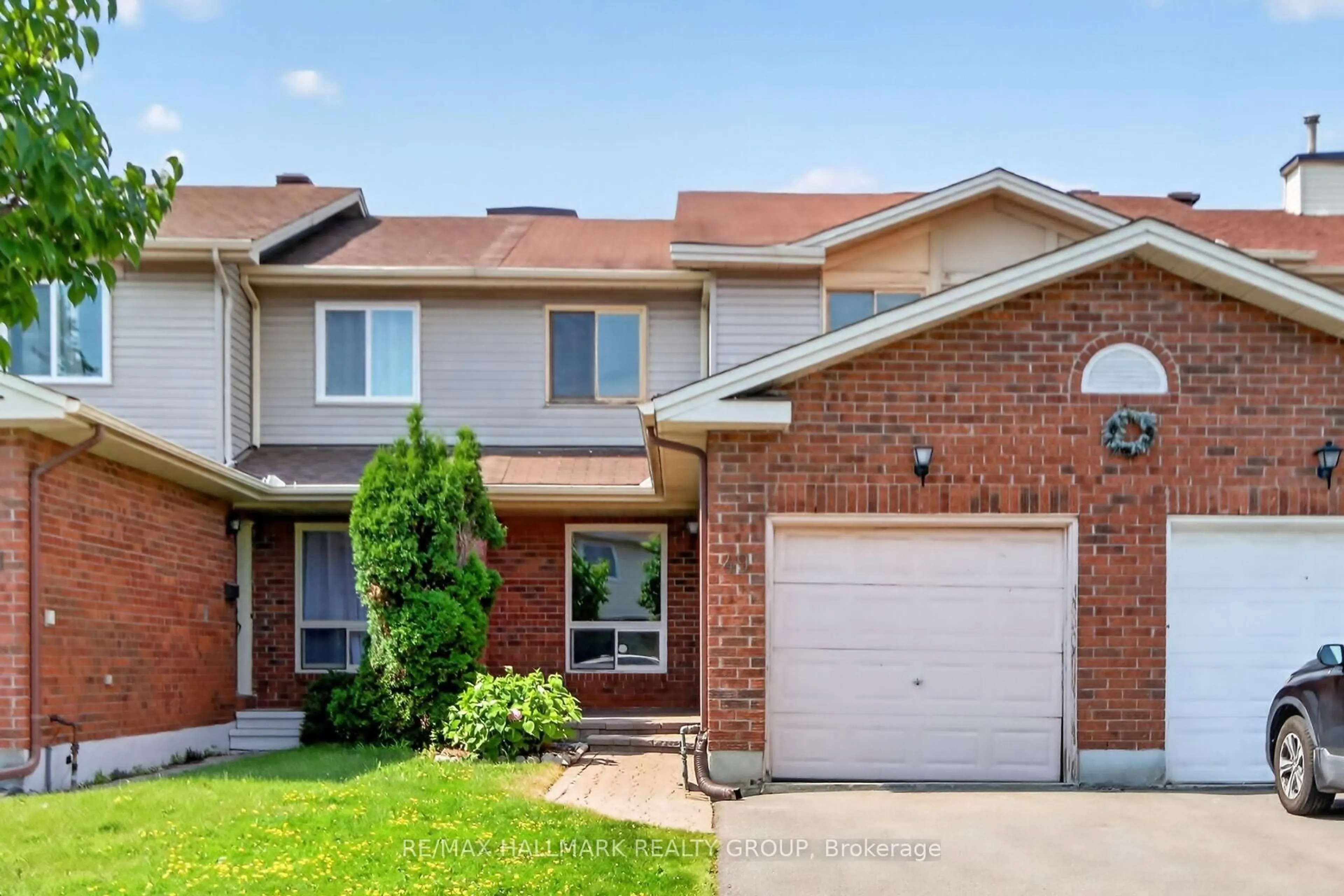 Home with brick exterior material, street for 49 Newport Cres, Ottawa Ontario K1T 3M2