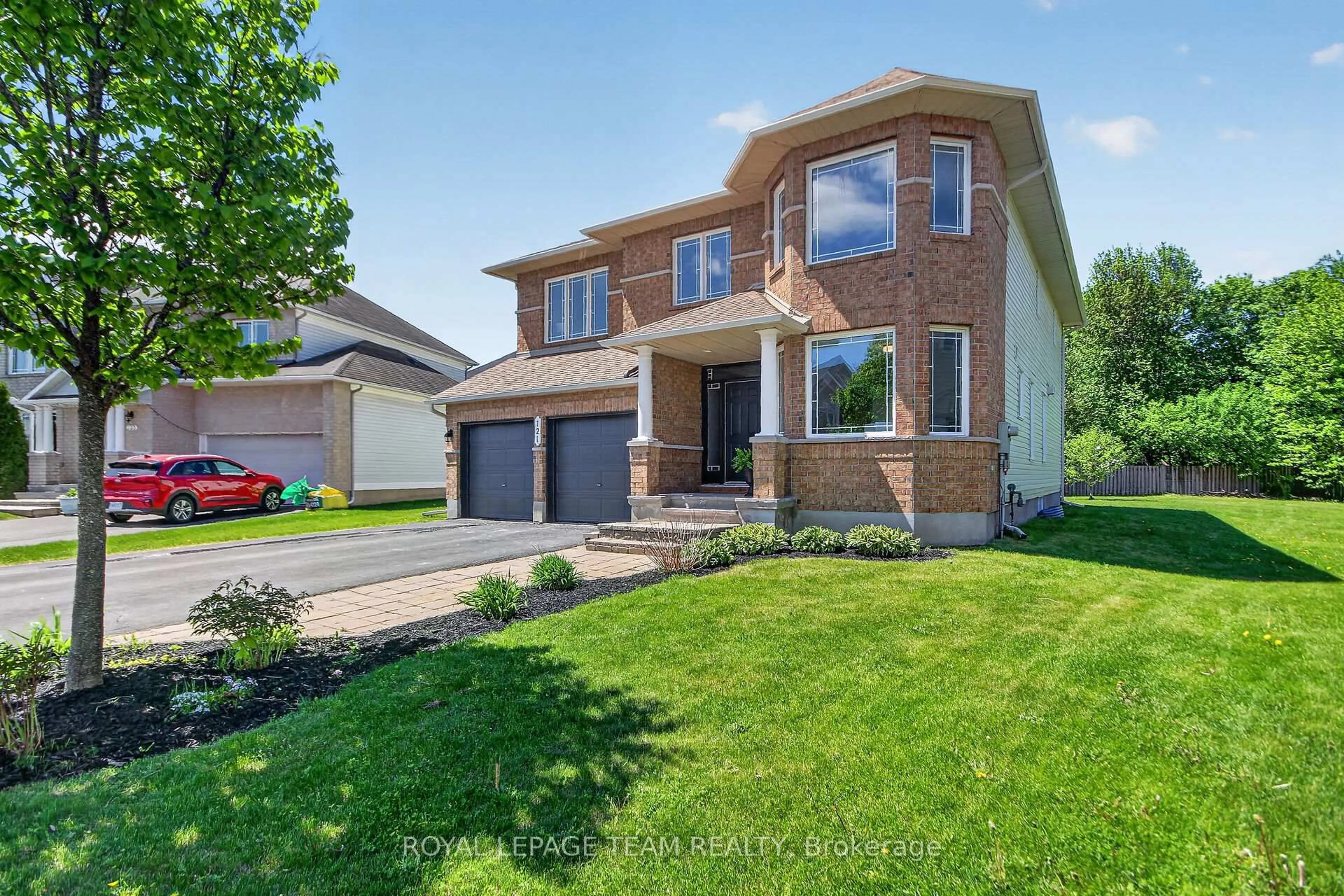 Home with brick exterior material, street for 121 Muskego Cres, Ottawa Ontario K2W 1H6