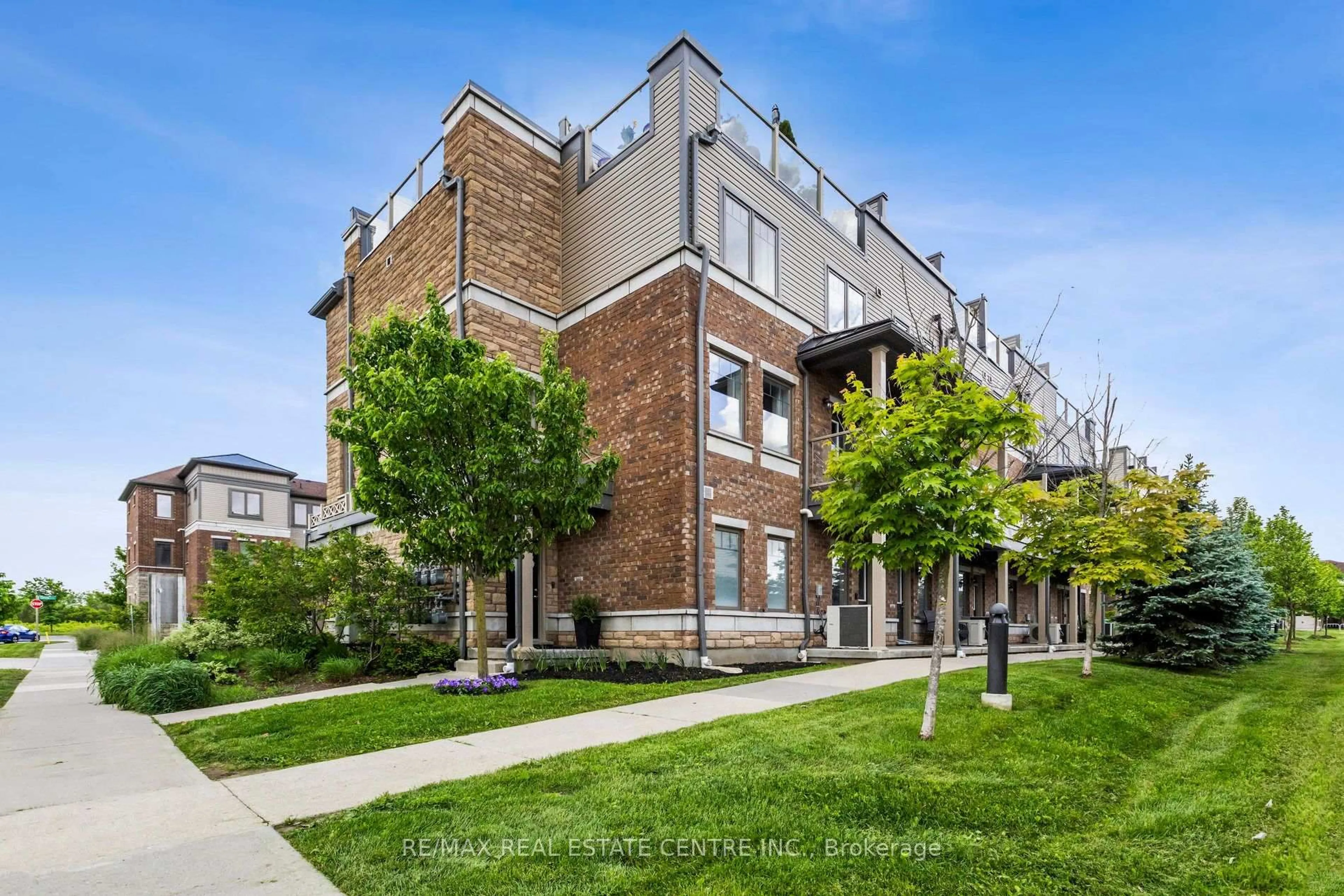 Home with brick exterior material, street for 70 Willowrun Dr #A1, Kitchener Ontario N2A 0J3
