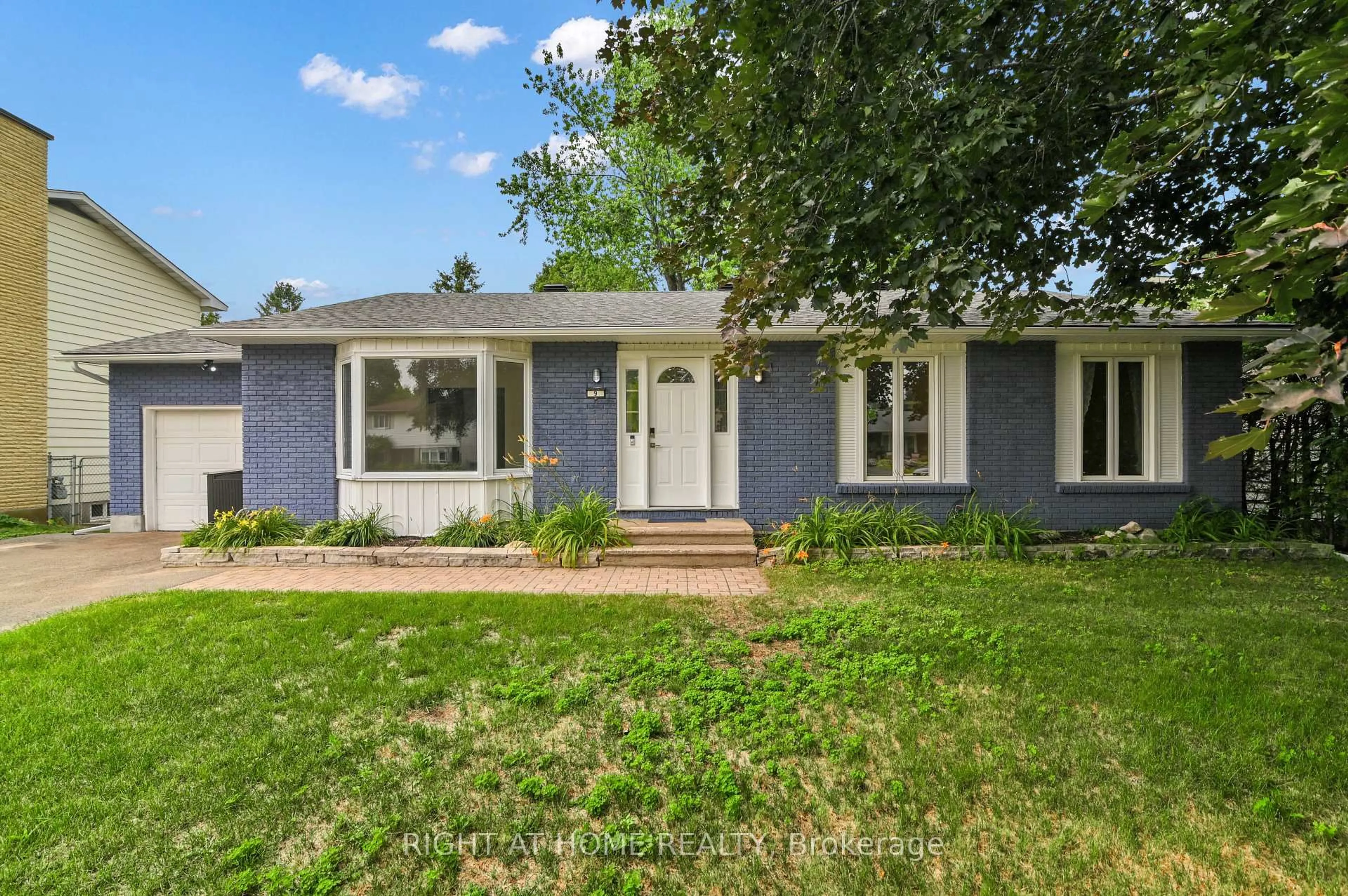 Home with brick exterior material, street for 9 Leetom Cres, Ottawa Ontario K2J 1E3