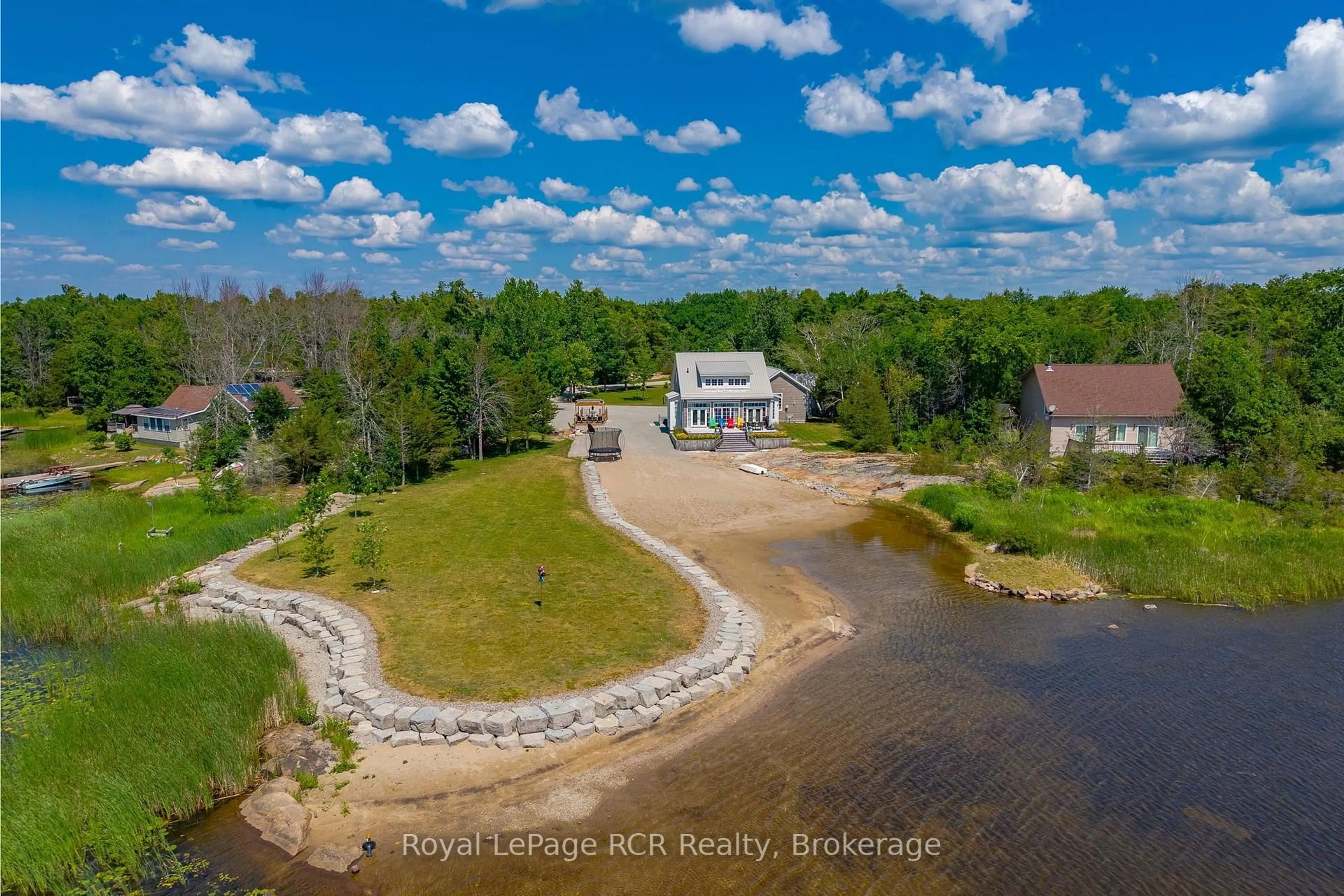 A pic from outside/outdoor area/front of a property/back of a property/a pic from drone, water/lake/river/ocean view for 101 Evergreen Lane, Georgian Bay Ontario L0K 1S0
