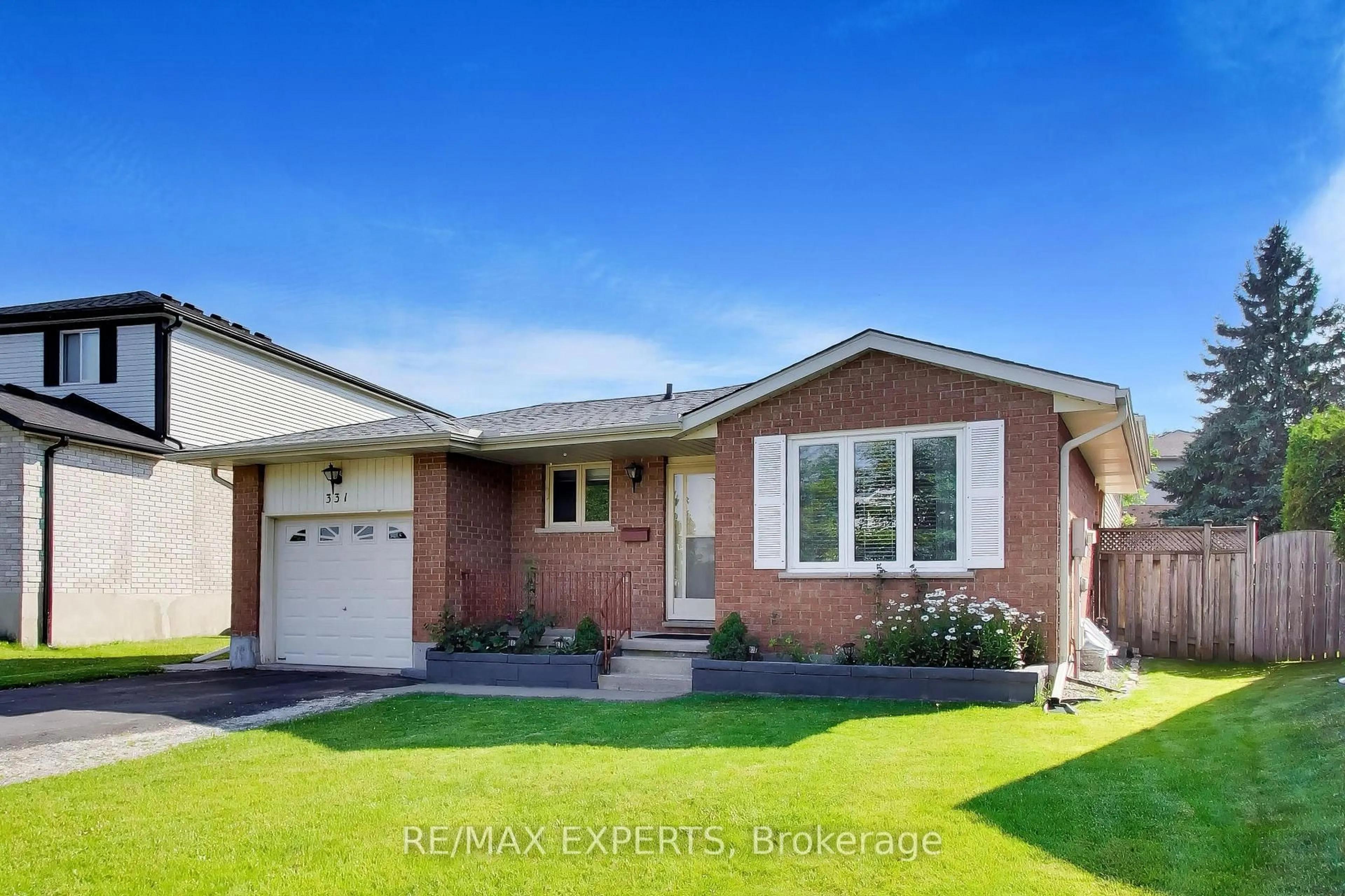 Home with brick exterior material, street for 331 Newbury Dr, Kitchener Ontario N2N 3A3