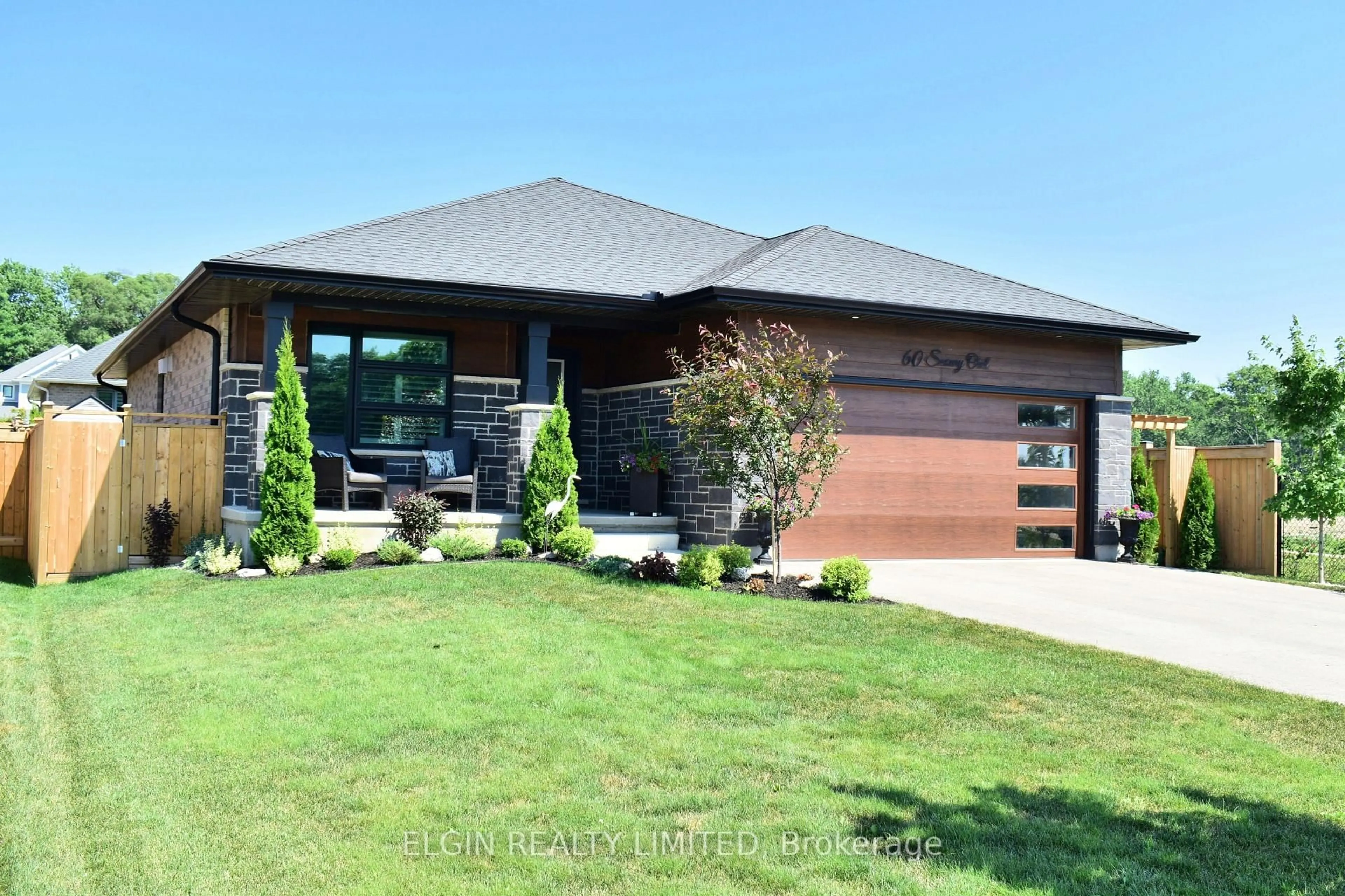 Home with brick exterior material, street for 60 Snowy Owl Tr, Central Elgin Ontario N5R 0M7