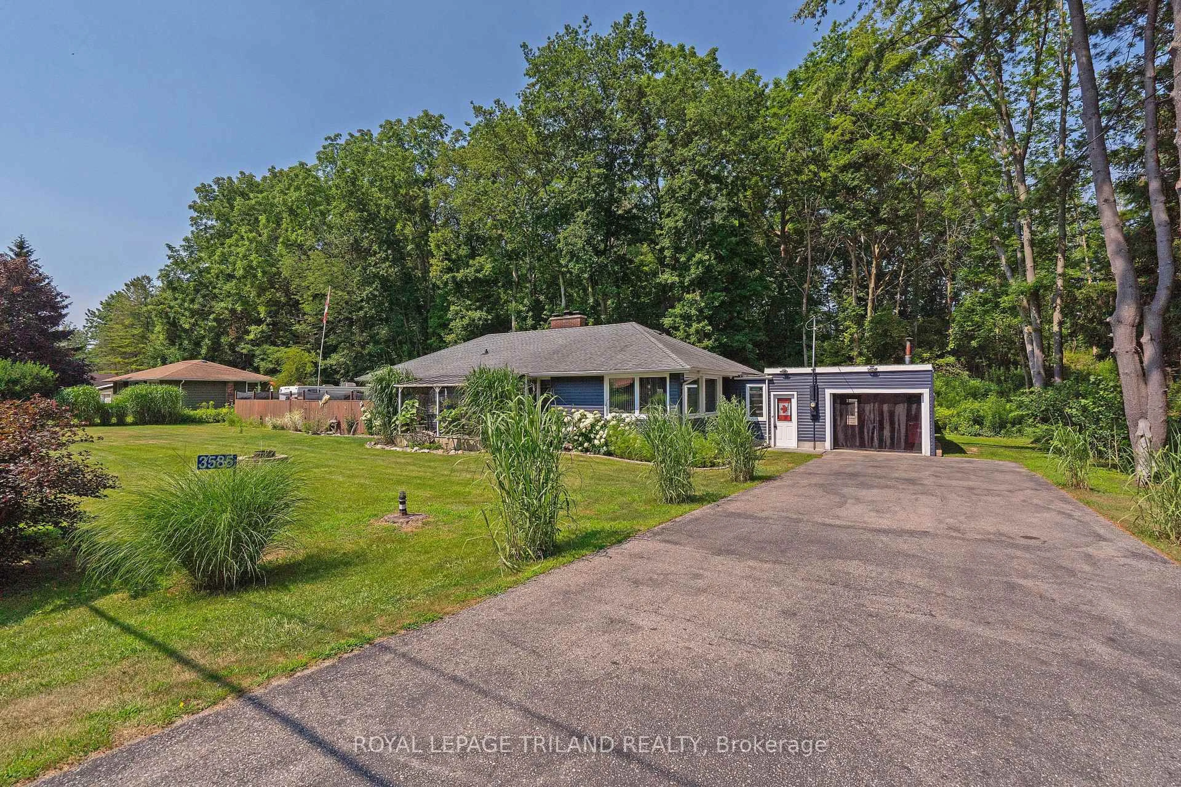 A pic from outside/outdoor area/front of a property/back of a property/a pic from drone, water/lake/river/ocean view for 3585 Imperial Rd, Malahide Ontario N5H 2R2