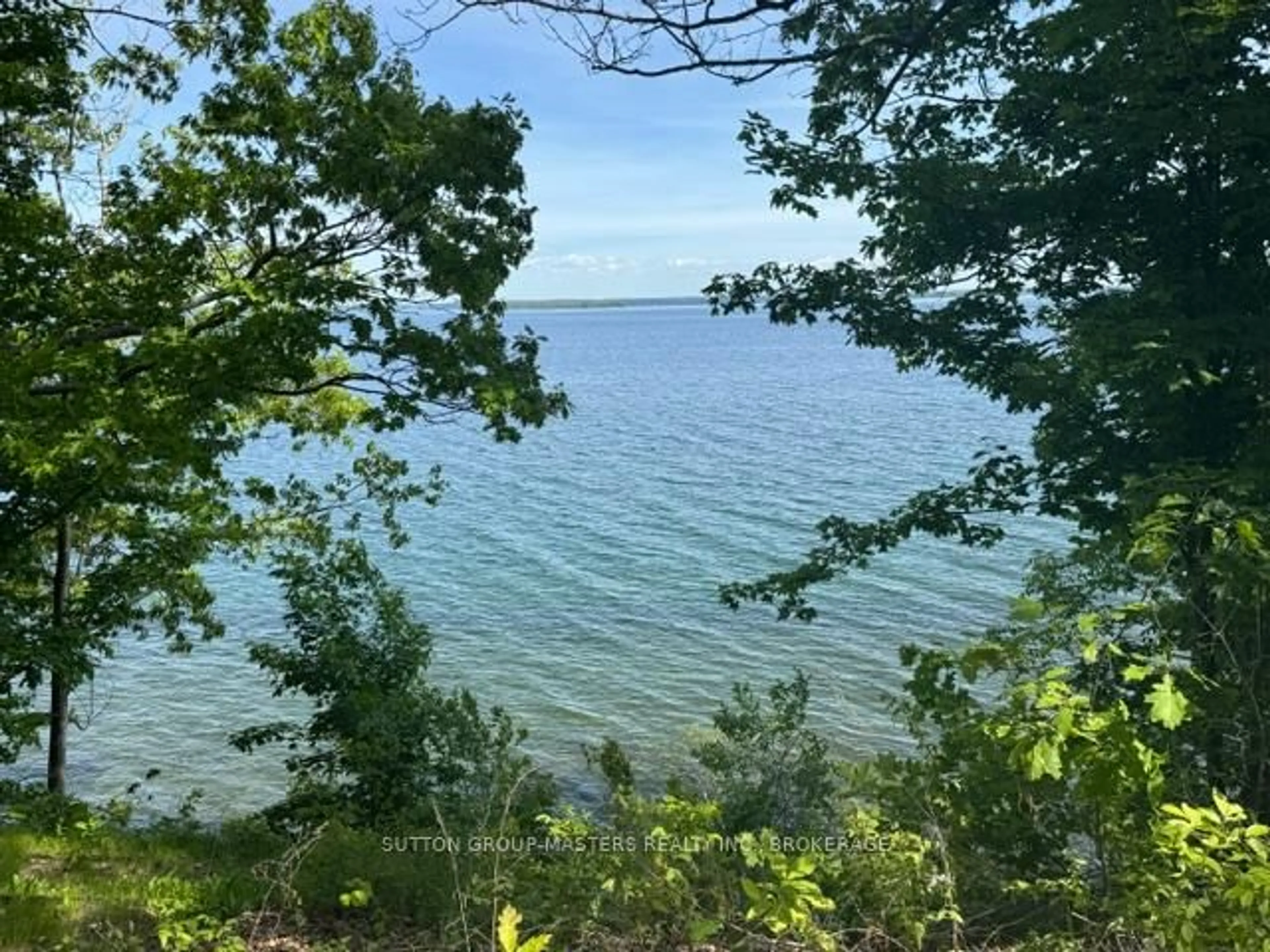 A pic from outside/outdoor area/front of a property/back of a property/a pic from drone, water/lake/river/ocean view for 2458 Howe Island Dr, Gananoque Ontario K7G 2V6