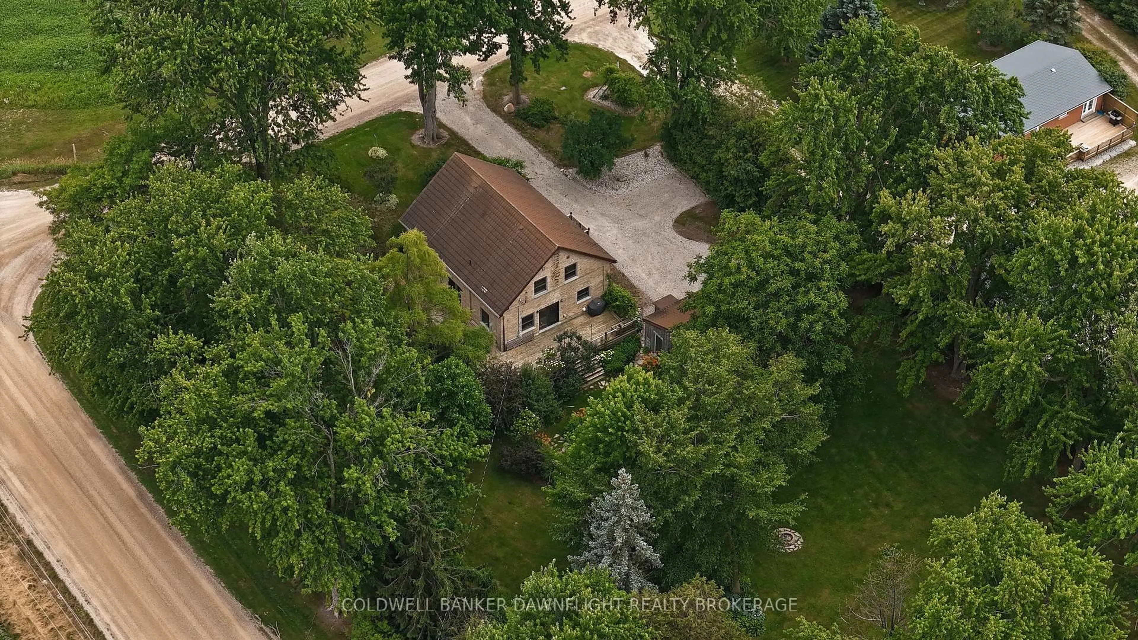 A pic from outside/outdoor area/front of a property/back of a property/a pic from drone, street for 15750 Fifteen Mile Rd, Middlesex Centre Ontario N0M 1P0