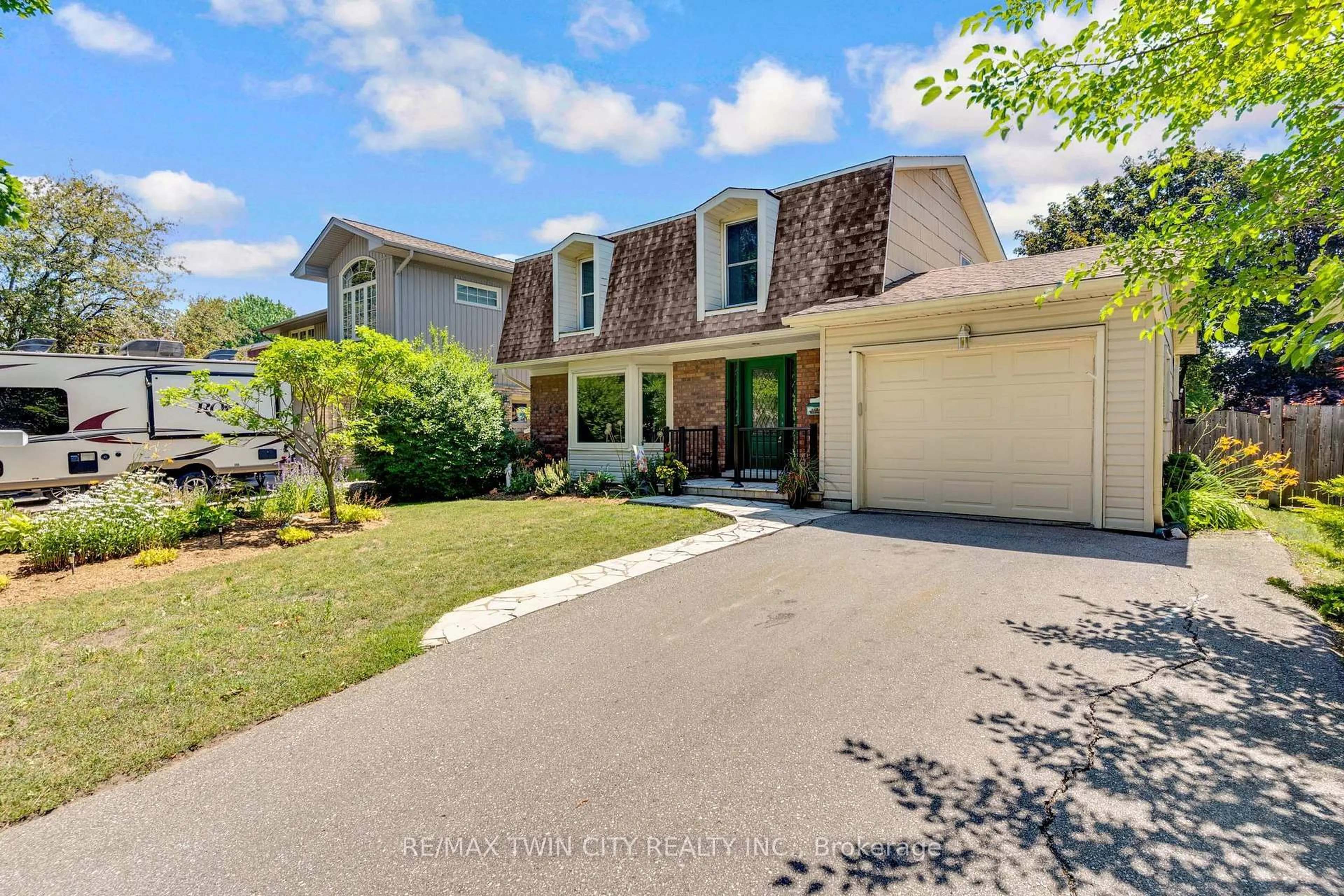 A pic from outside/outdoor area/front of a property/back of a property/a pic from drone, street for 15 Lewis Cres, Kitchener Ontario N2A 2T7