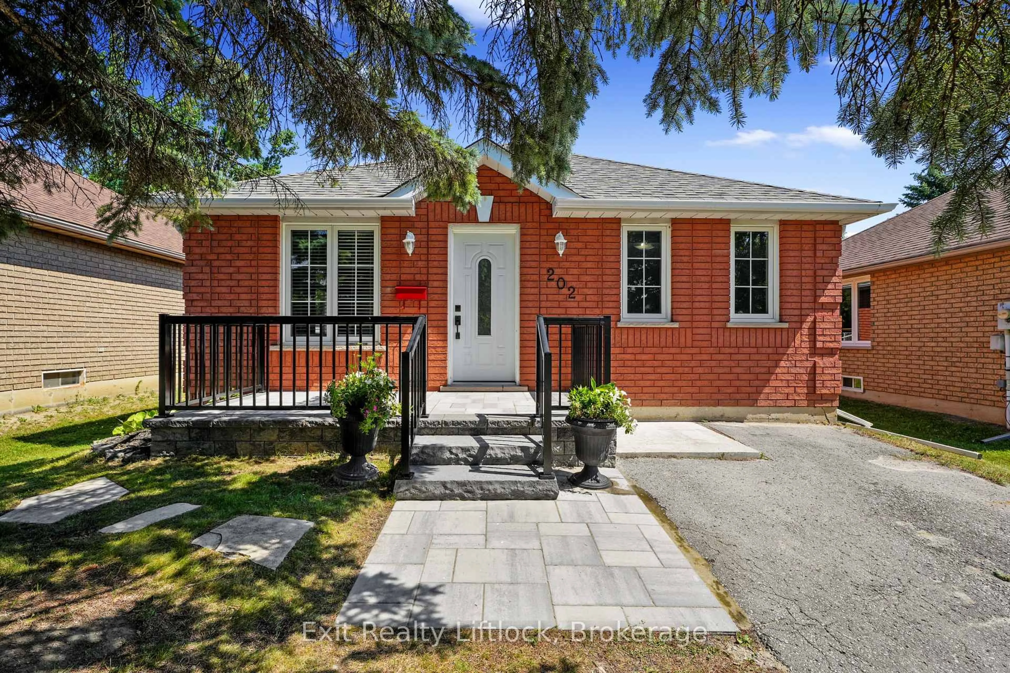 Home with brick exterior material, street for 202 Milroy Dr, Peterborough Ontario K9H 7M8