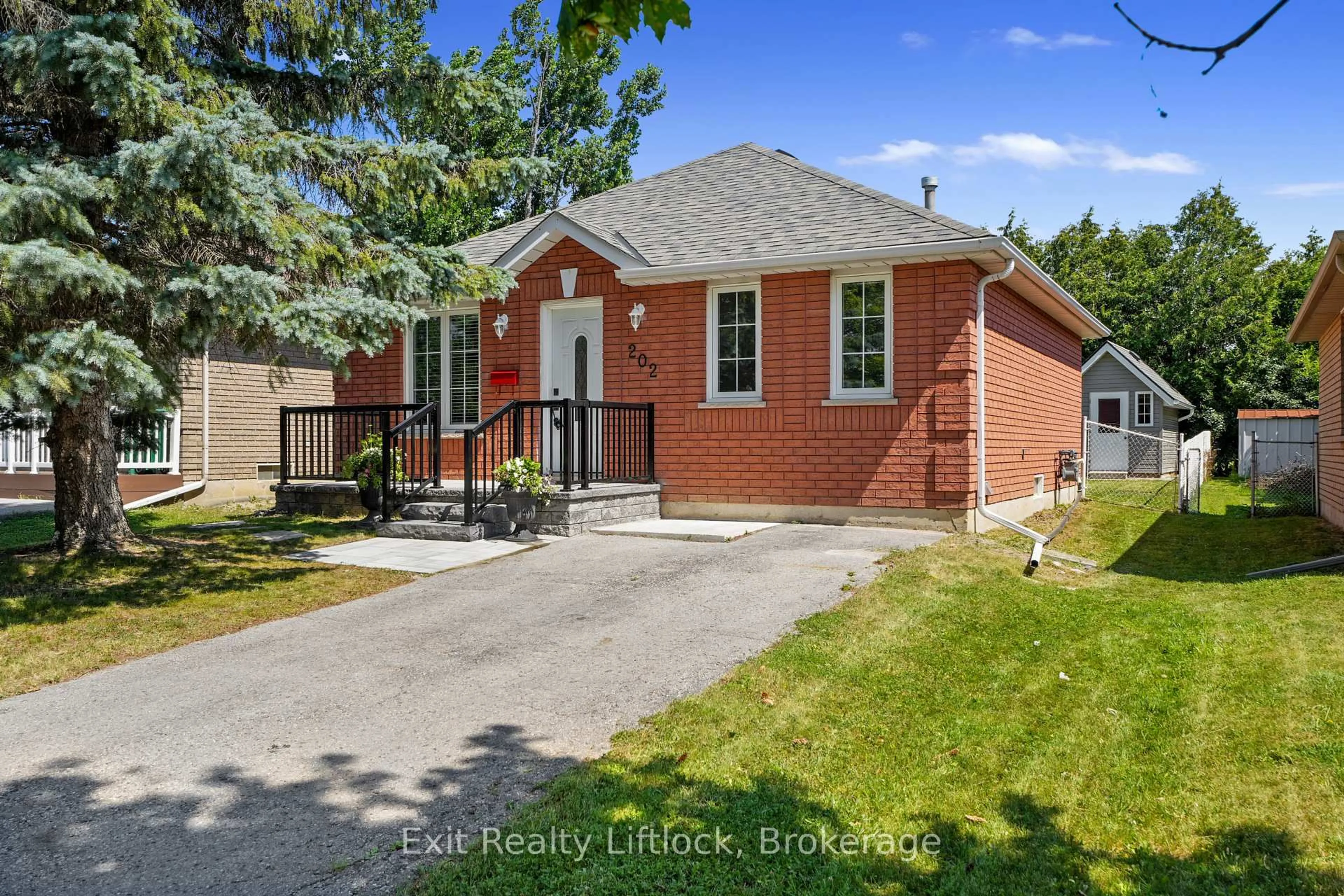 Home with brick exterior material, street for 202 Milroy Dr, Peterborough Ontario K9H 7M8
