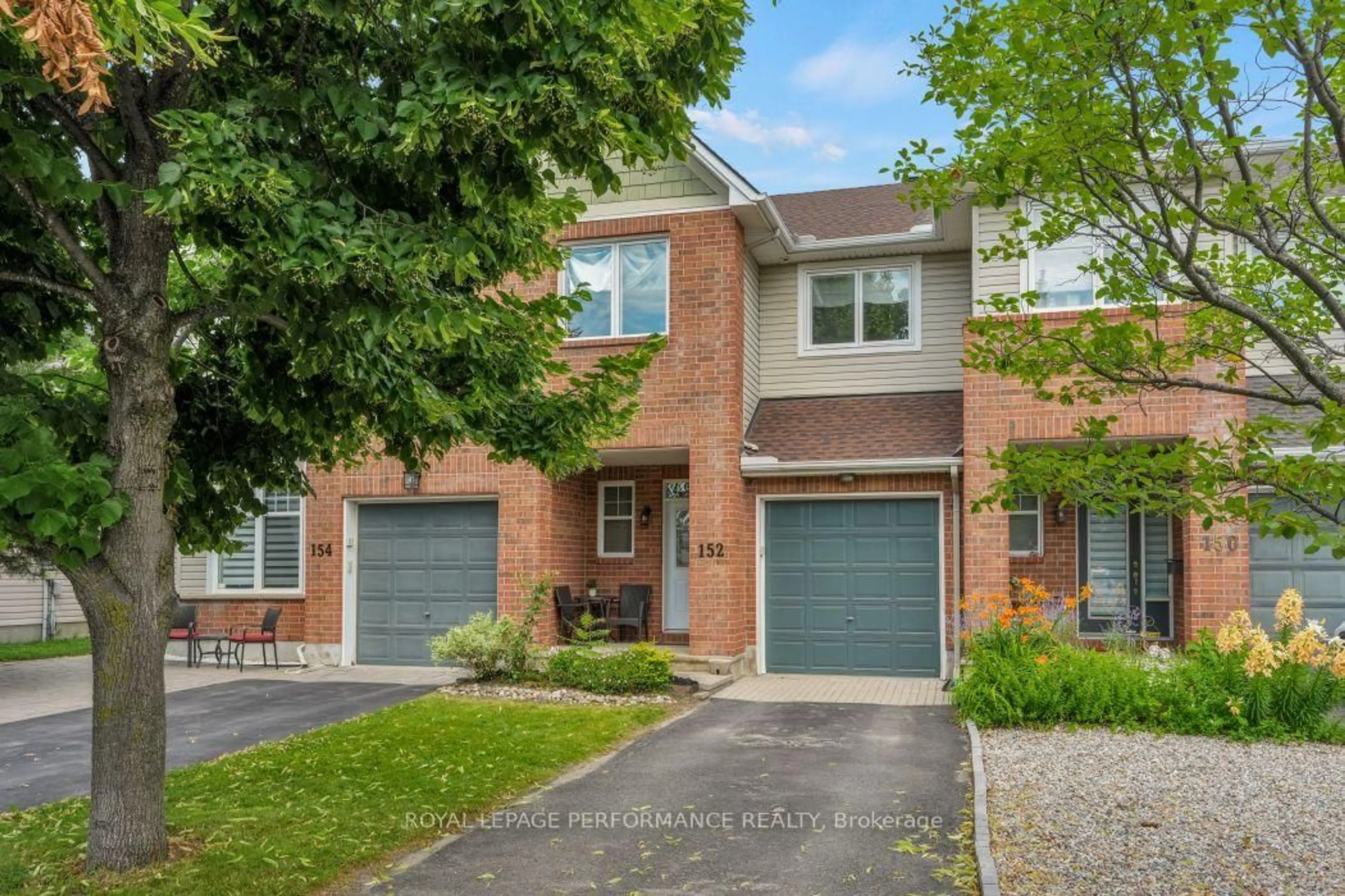 Home with brick exterior material, street for 152 Purple Finch Cres, Ottawa Ontario K1T 4G9