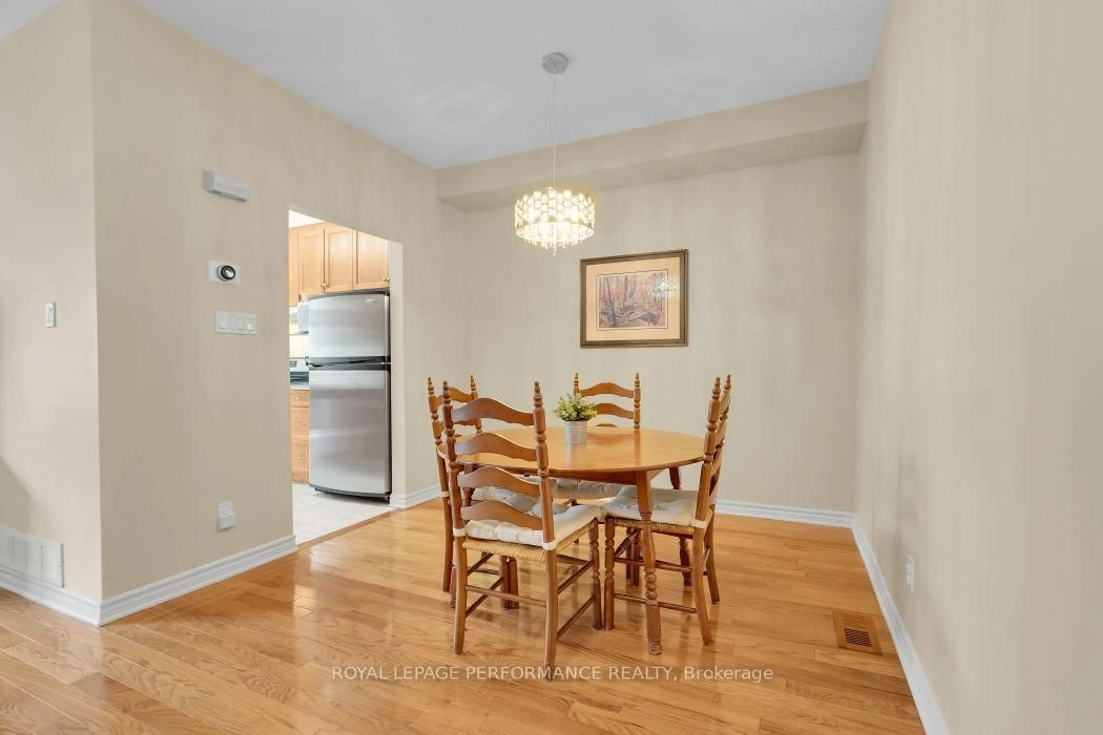 Dining room, wood/laminate floor for 152 Purple Finch Cres, Ottawa Ontario K1T 4G9