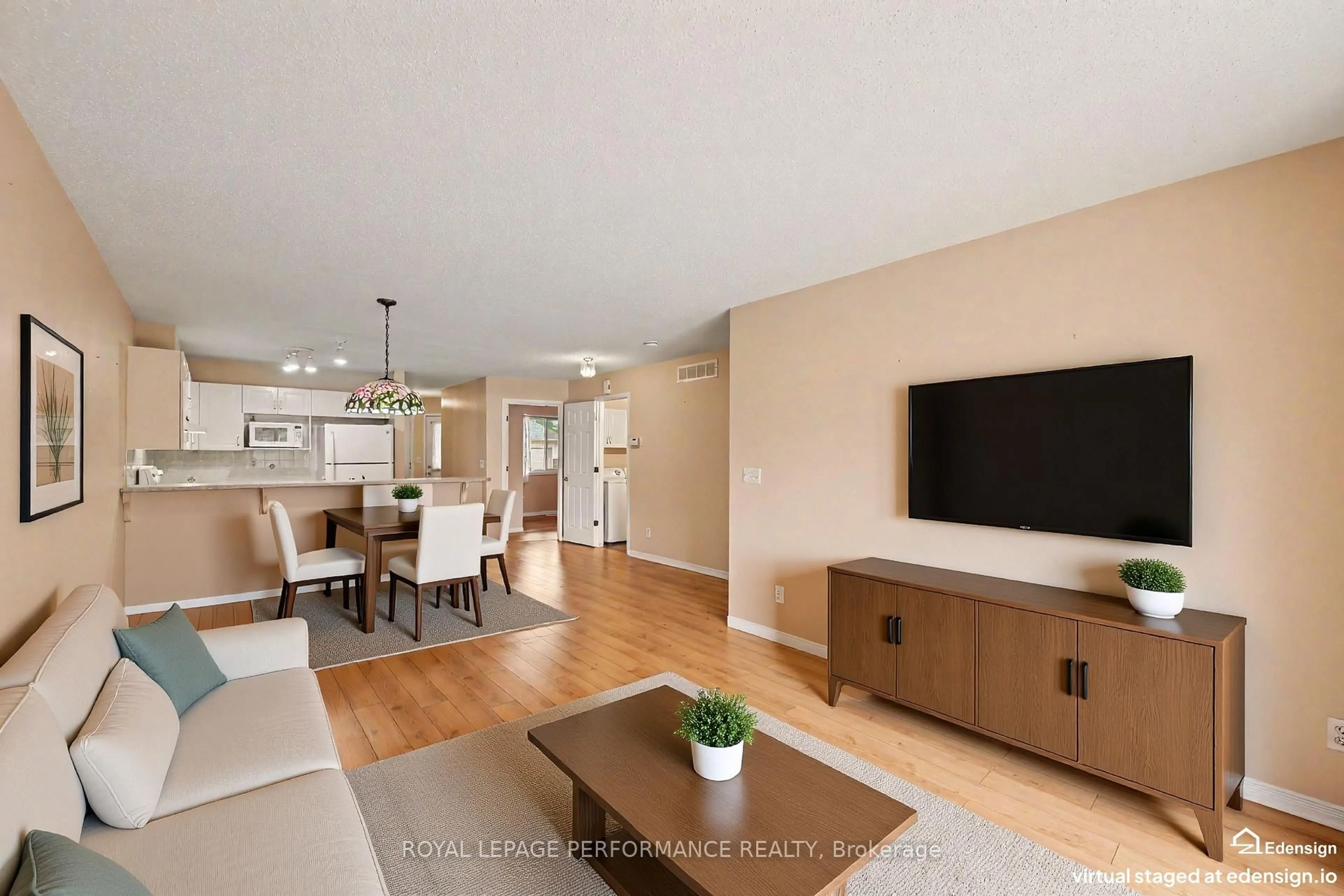 Living room with furniture, wood/laminate floor for 18 Daphne Cres, Ottawa Ontario K2S 1Y1