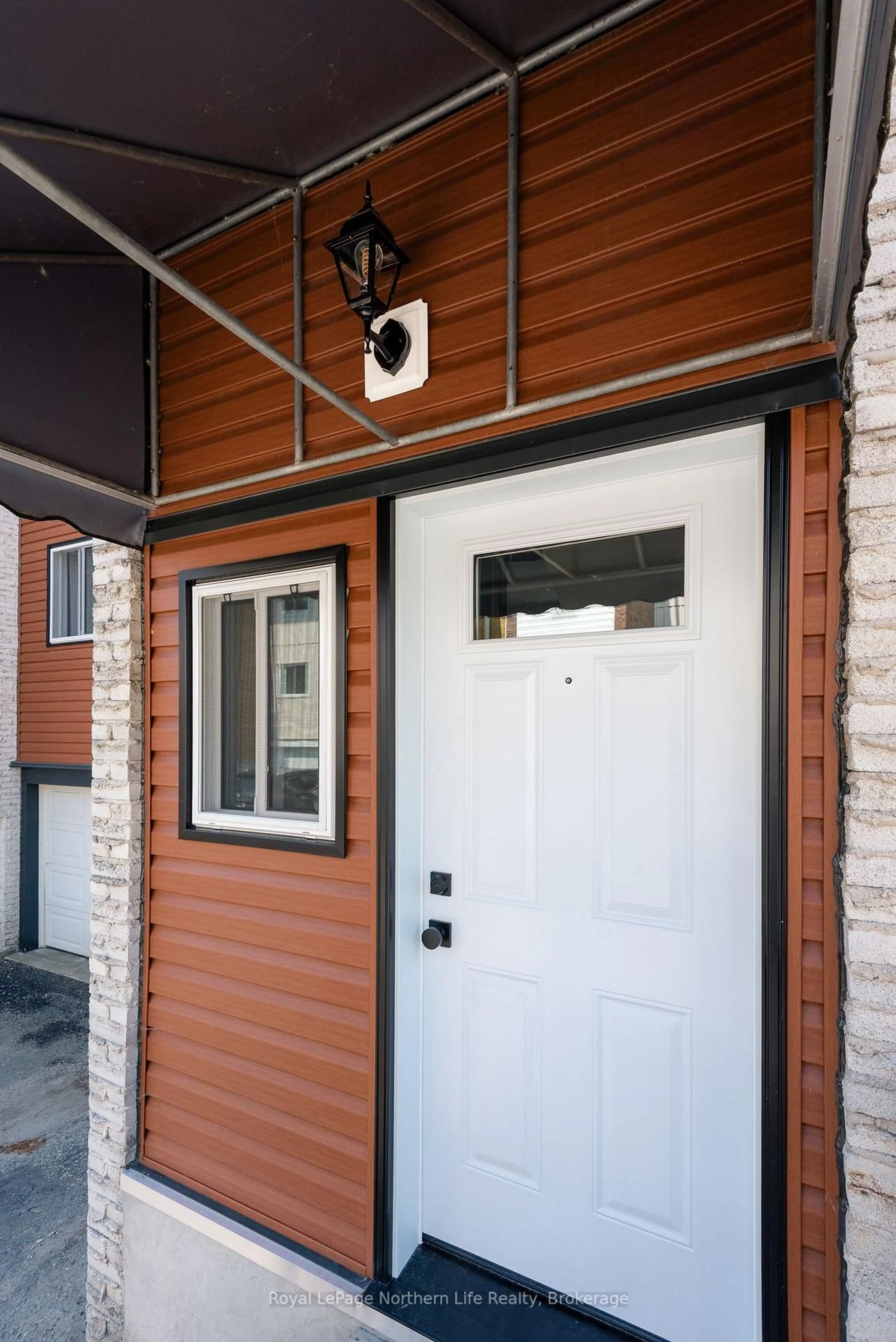 Home with vinyl exterior material, street for 850 Lakeshore Dr #8, North Bay Ontario P1A 2G8