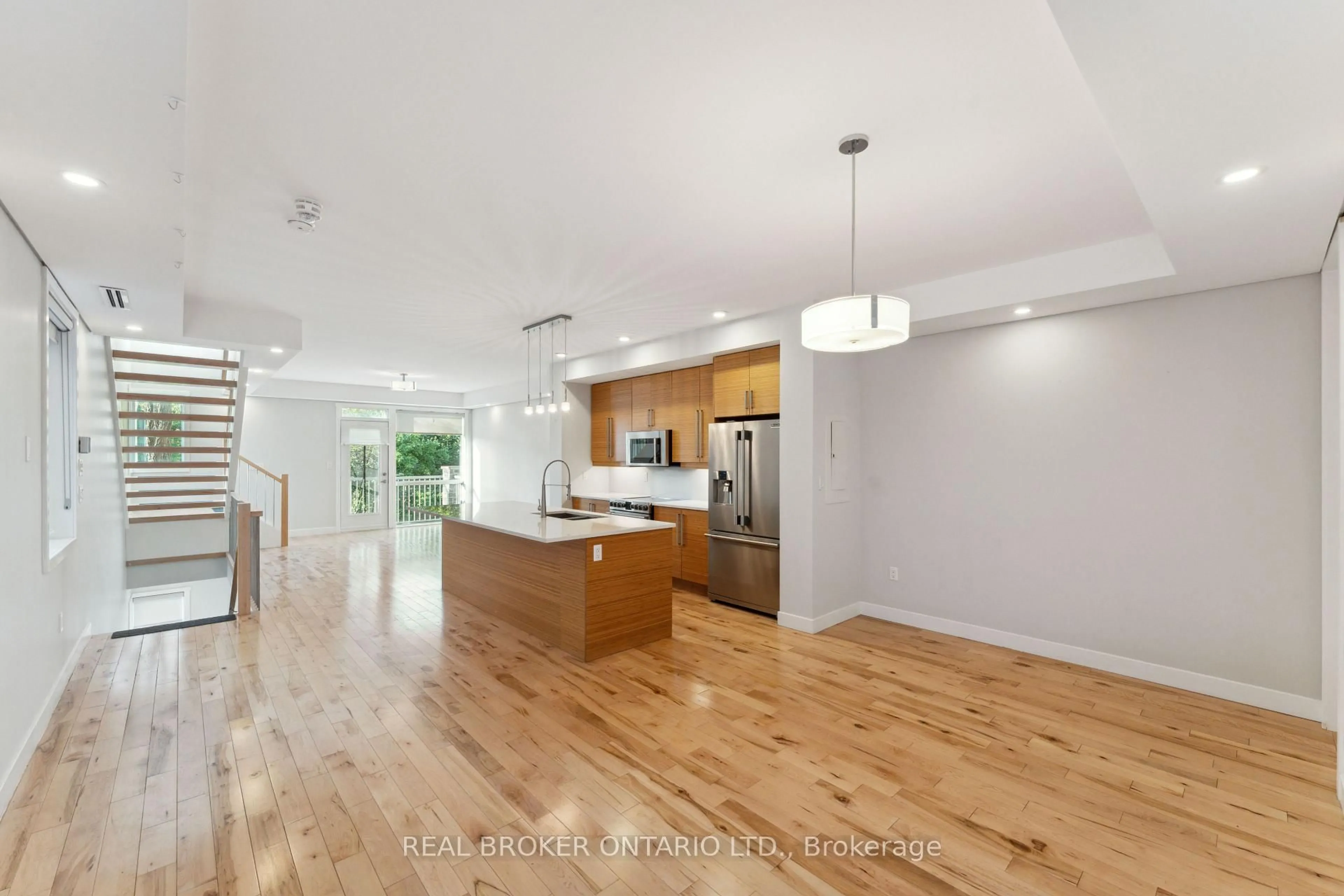 Open concept kitchen, wood/laminate floor for 36 Ontario St, Ottawa Ontario K1K 1L1