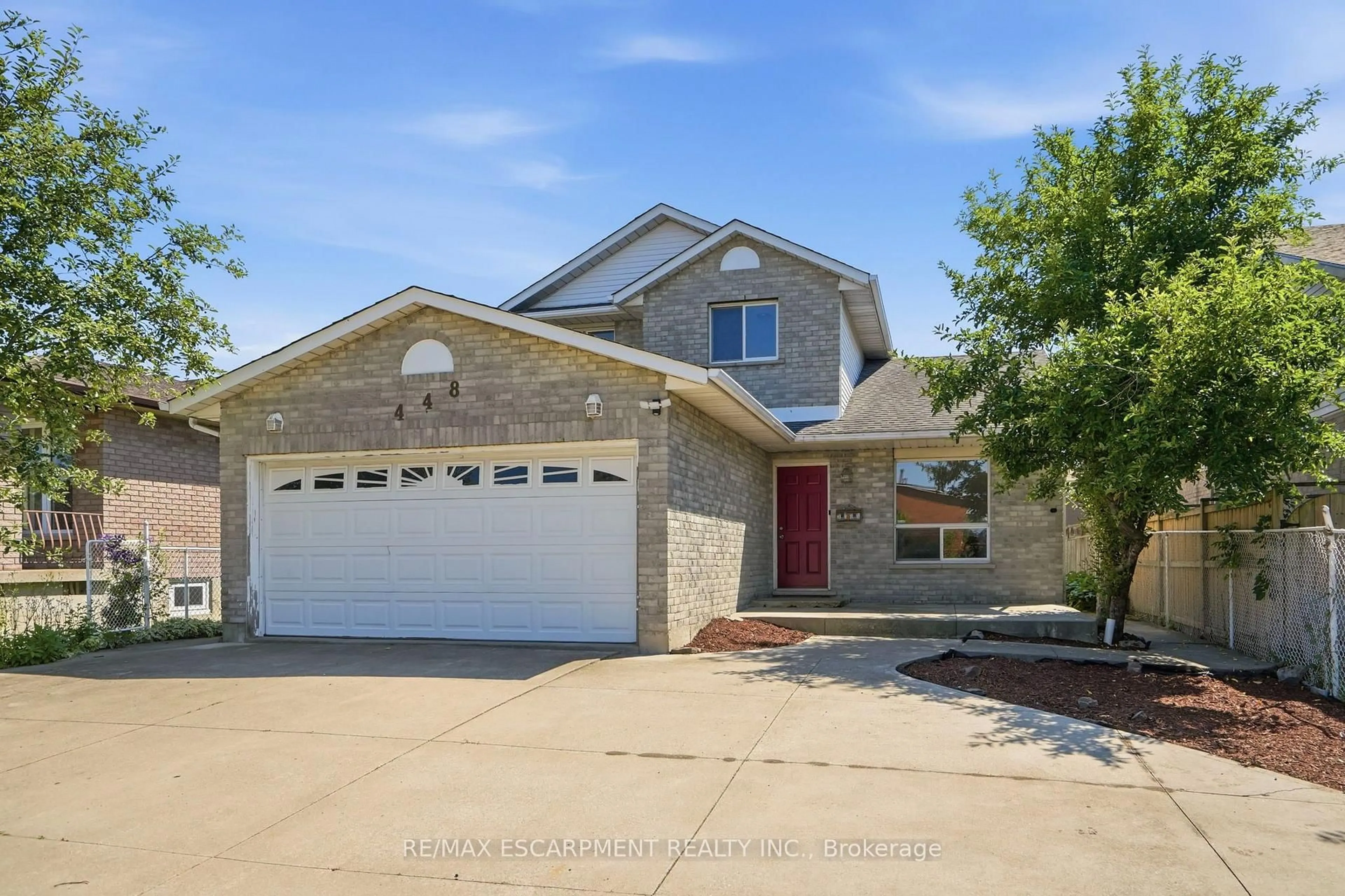 Home with brick exterior material, street for 448 STONE CHURCH Rd, Hamilton Ontario L9B 2A2
