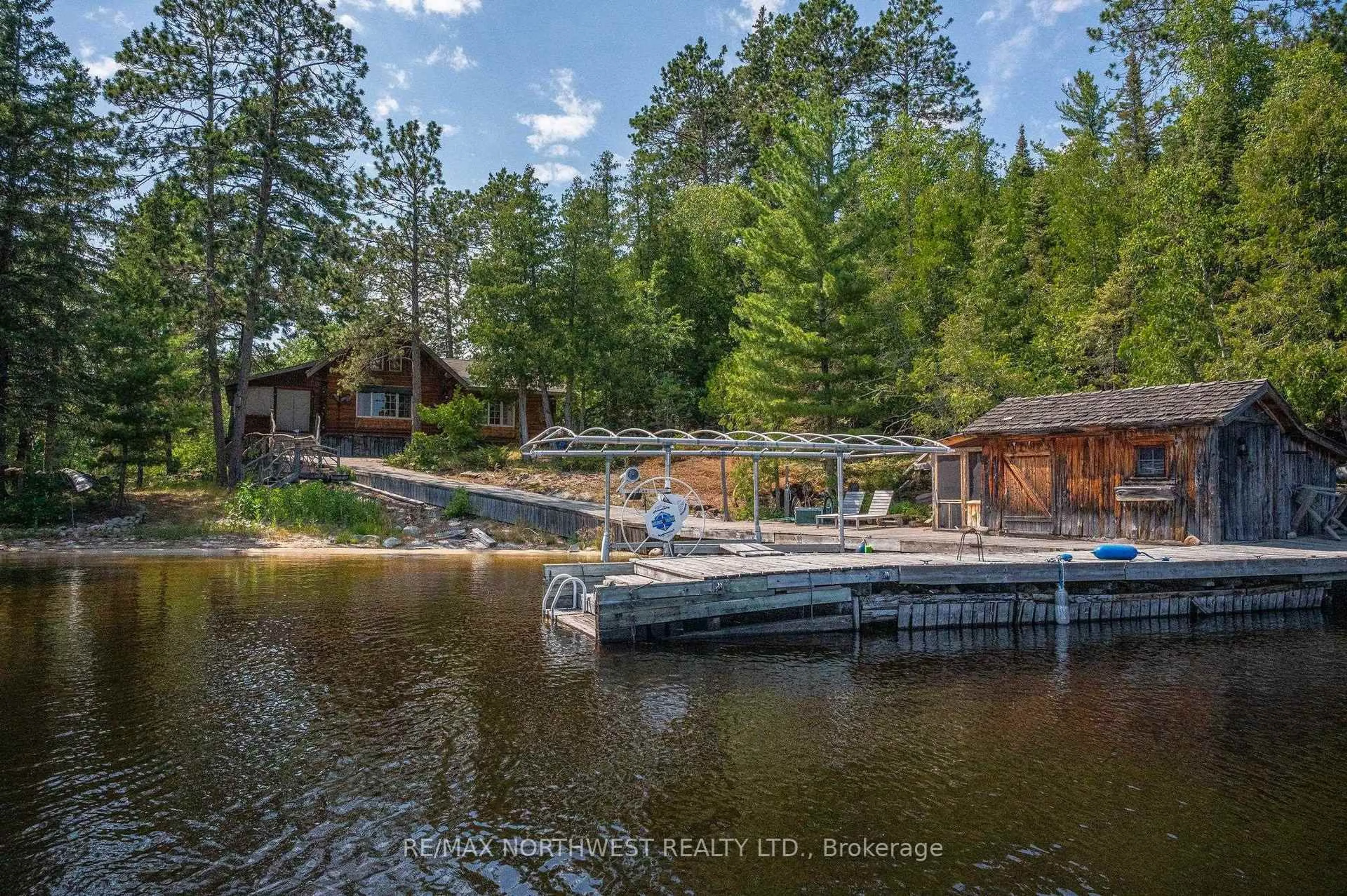 A pic from outside/outdoor area/front of a property/back of a property/a pic from drone, water/lake/river/ocean view for 1 Red Pine Island, Rainy River Remote Area Ontario P9A 3M3
