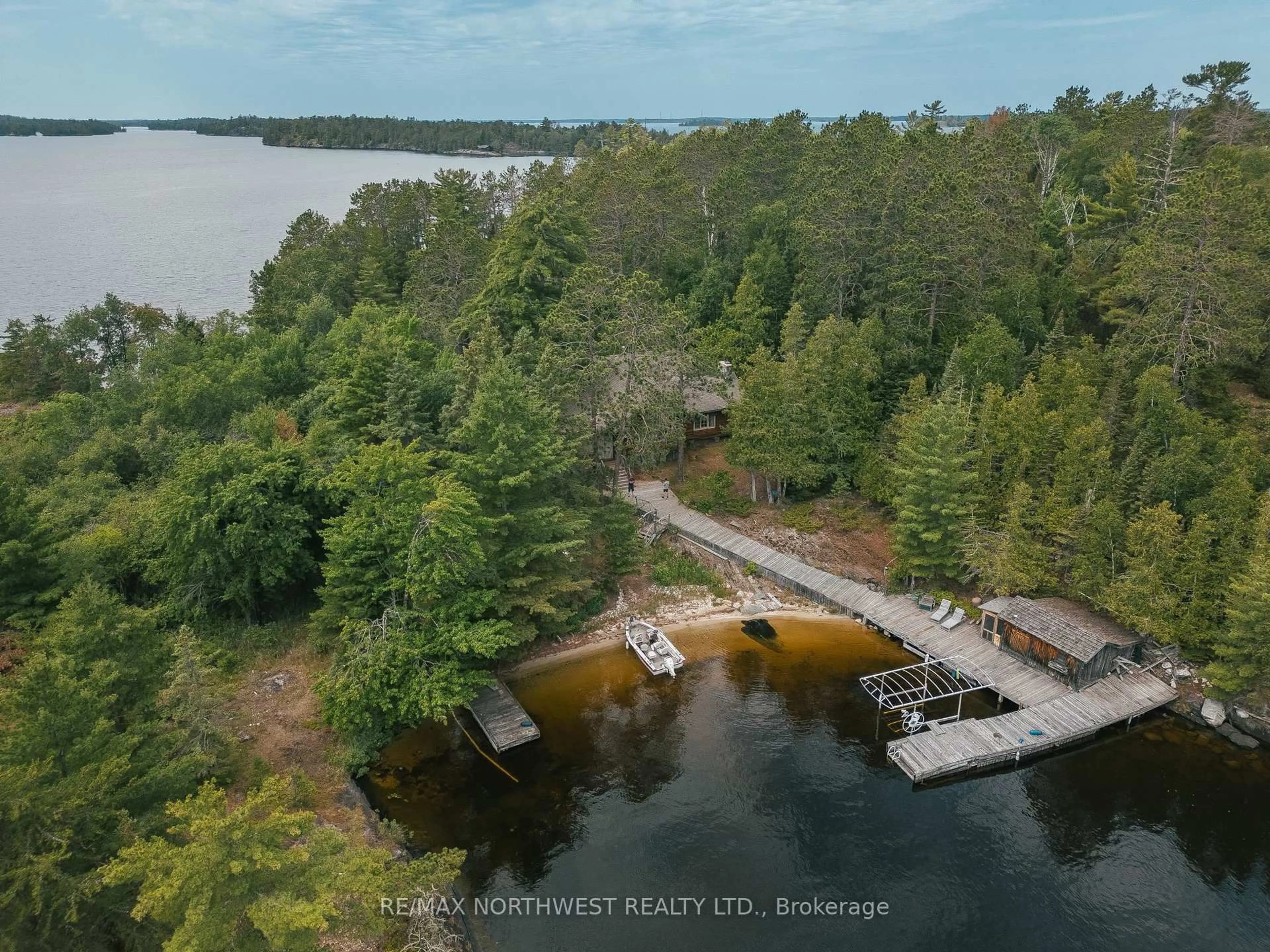 A pic from outside/outdoor area/front of a property/back of a property/a pic from drone, water/lake/river/ocean view for 1 Red Pine Island, Rainy River Remote Area Ontario P9A 3M3