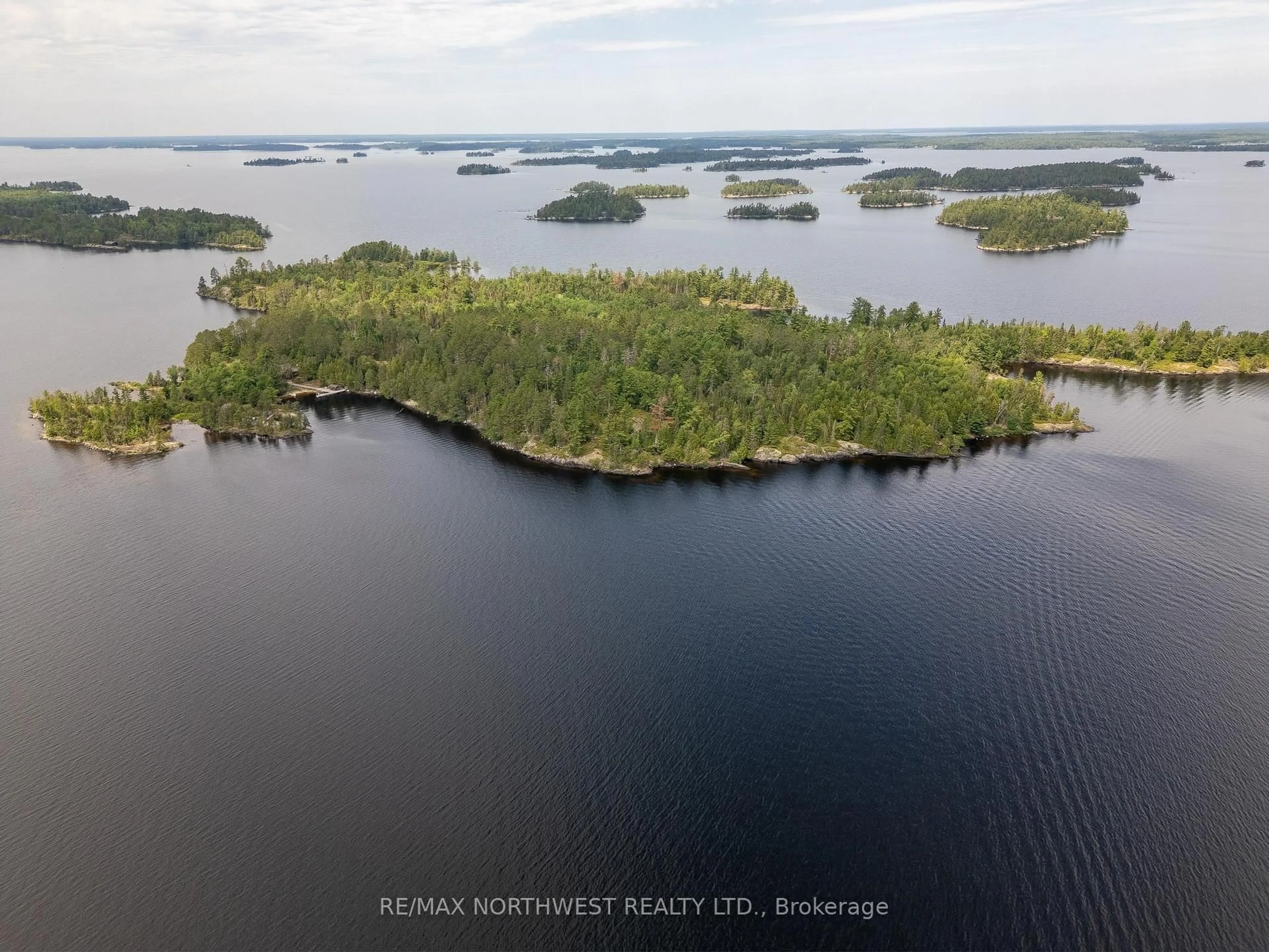 A pic from outside/outdoor area/front of a property/back of a property/a pic from drone, water/lake/river/ocean view for 1 Red Pine Island, Rainy River Remote Area Ontario P9A 3M3