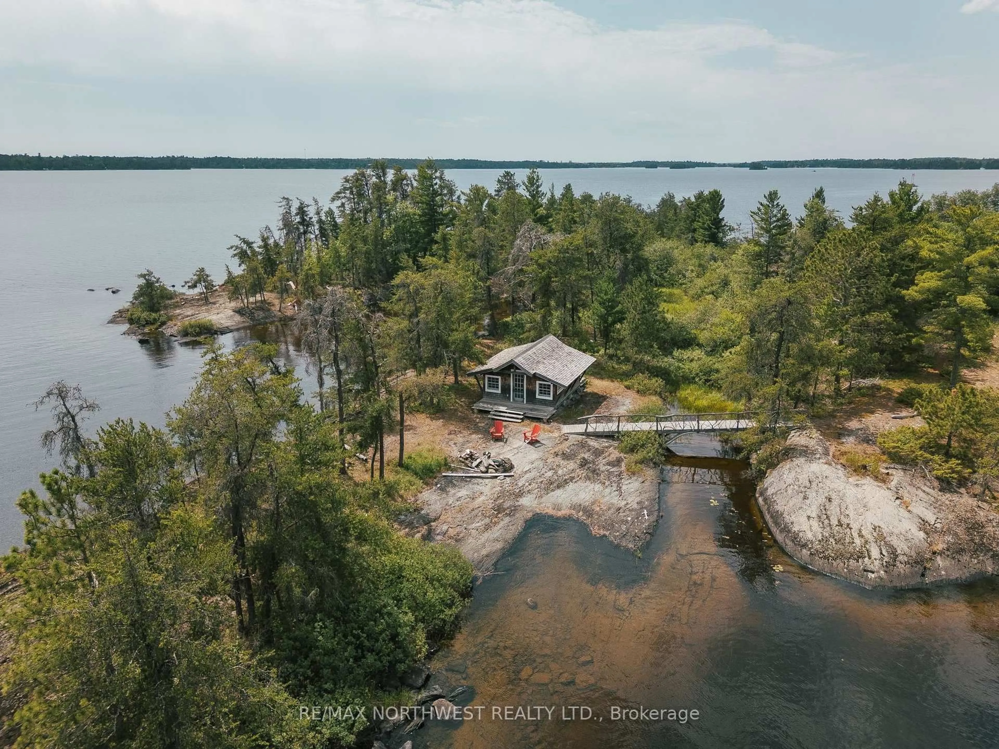A pic from outside/outdoor area/front of a property/back of a property/a pic from drone, water/lake/river/ocean view for 1 Red Pine Island, Rainy River Remote Area Ontario P9A 3M3