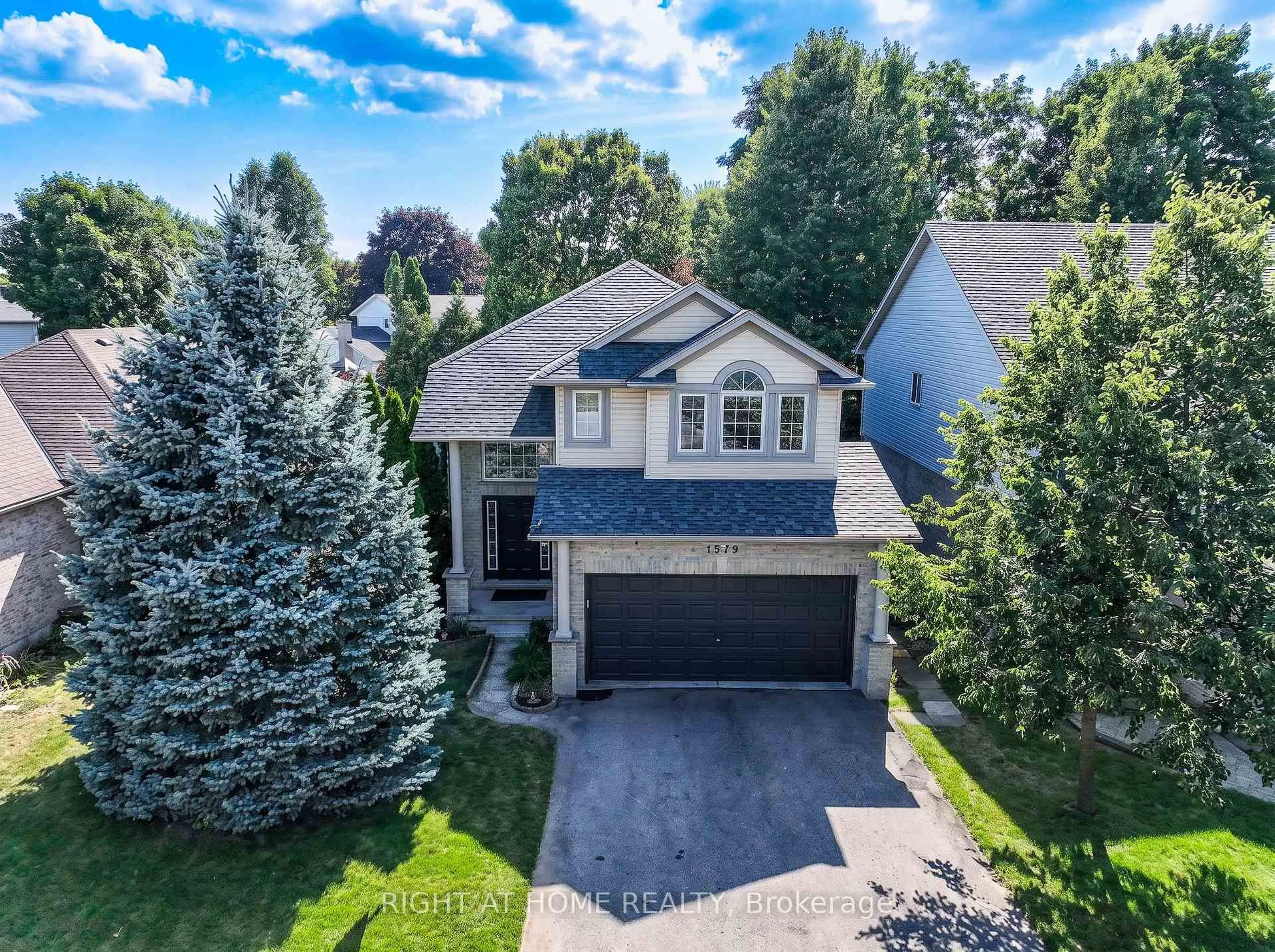 A pic from outside/outdoor area/front of a property/back of a property/a pic from drone, street for 1579 Devos Dr, London North Ontario N5X 4K8