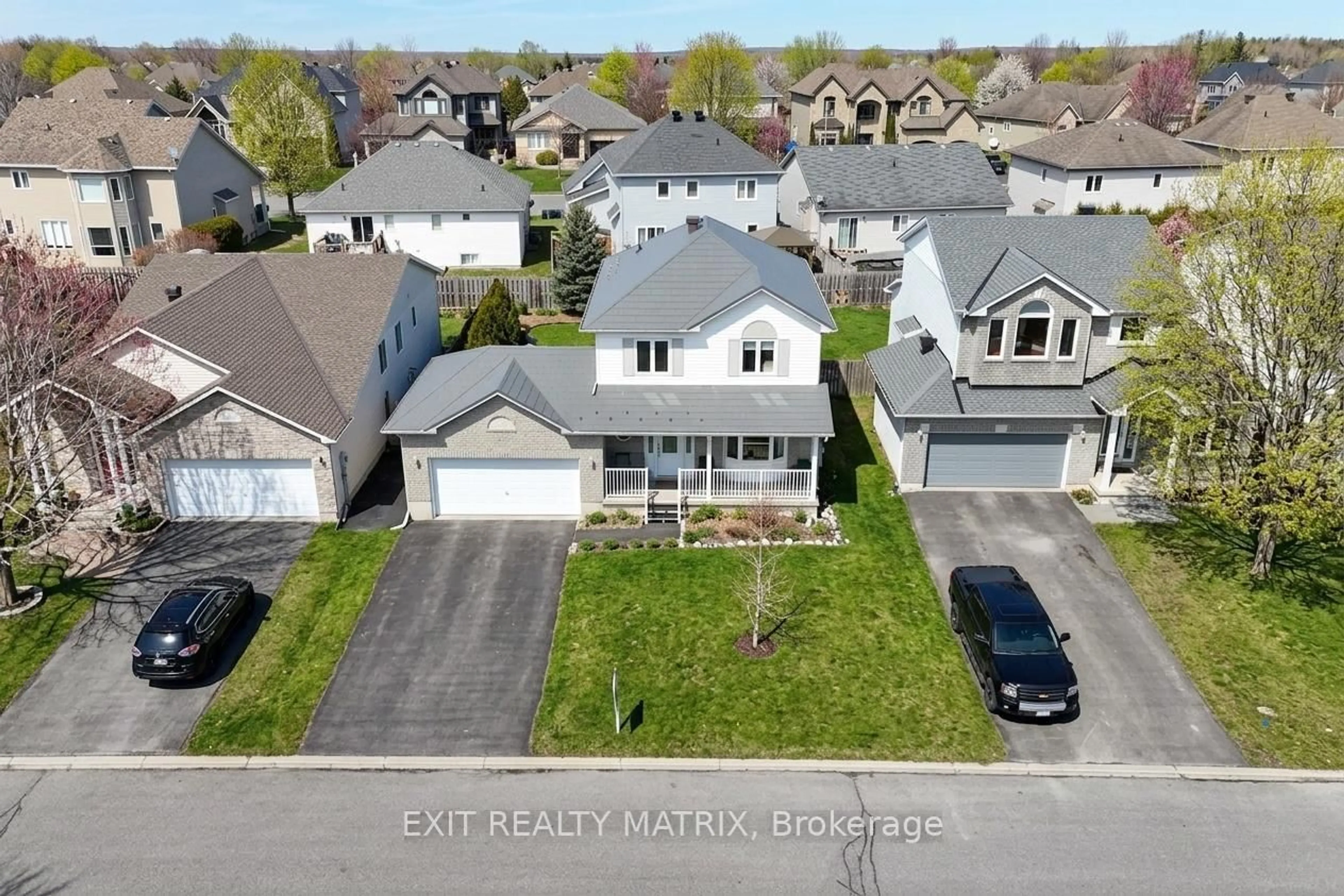 A pic from outside/outdoor area/front of a property/back of a property/a pic from drone, street for 106 Lachaine St, Russell Ontario K0A 1W0