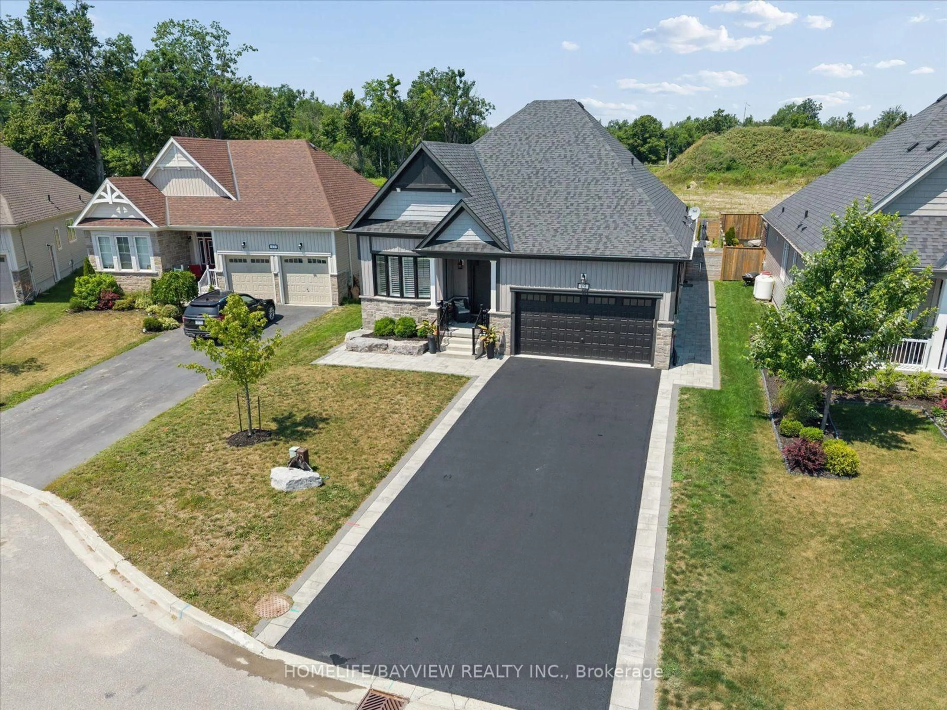 A pic from outside/outdoor area/front of a property/back of a property/a pic from drone, street for 19 Sedona Crt, Kawartha Lakes Ontario K0M 1A0