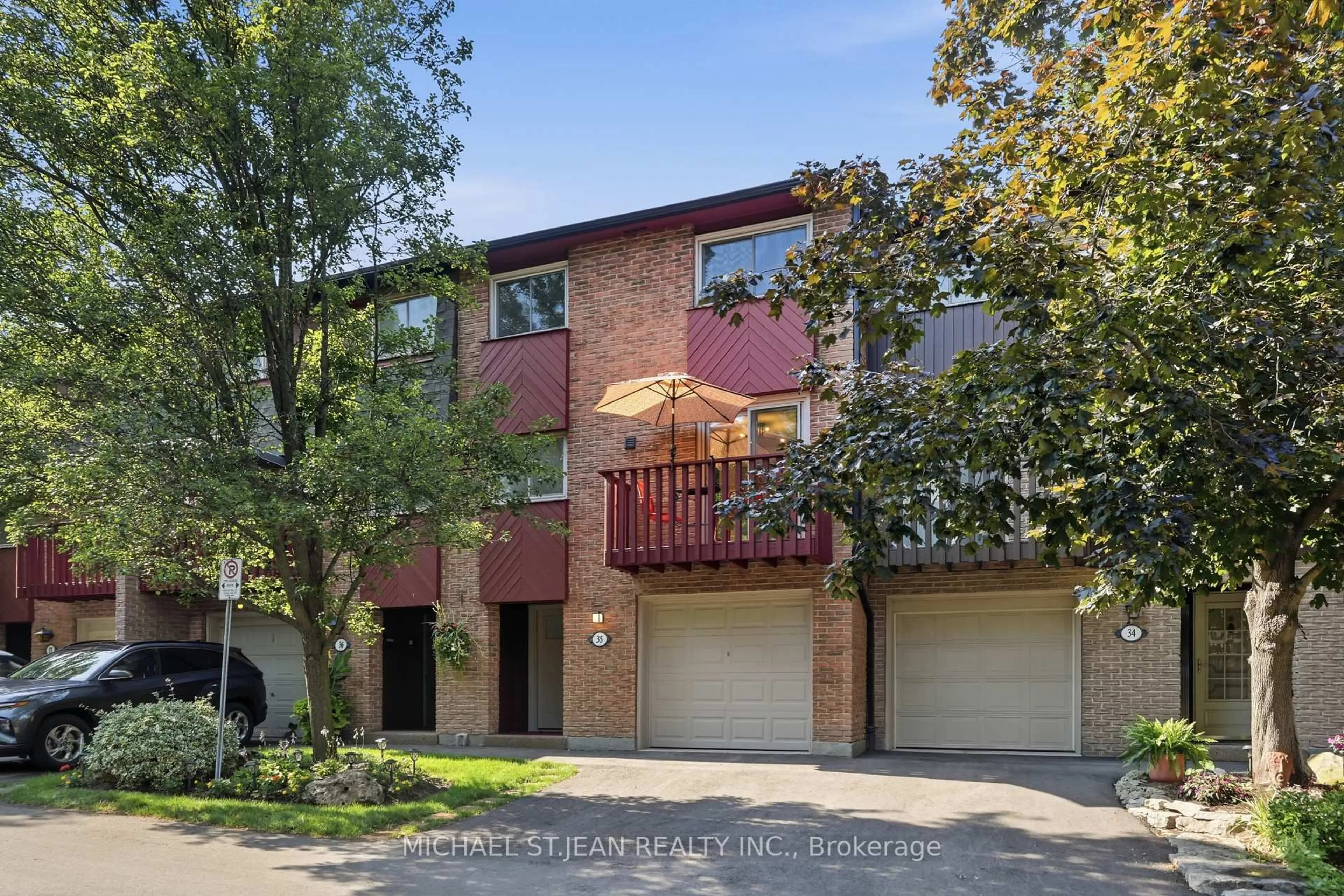 Home with brick exterior material, street for 1967 Main St #35, Hamilton Ontario L8S 4P4