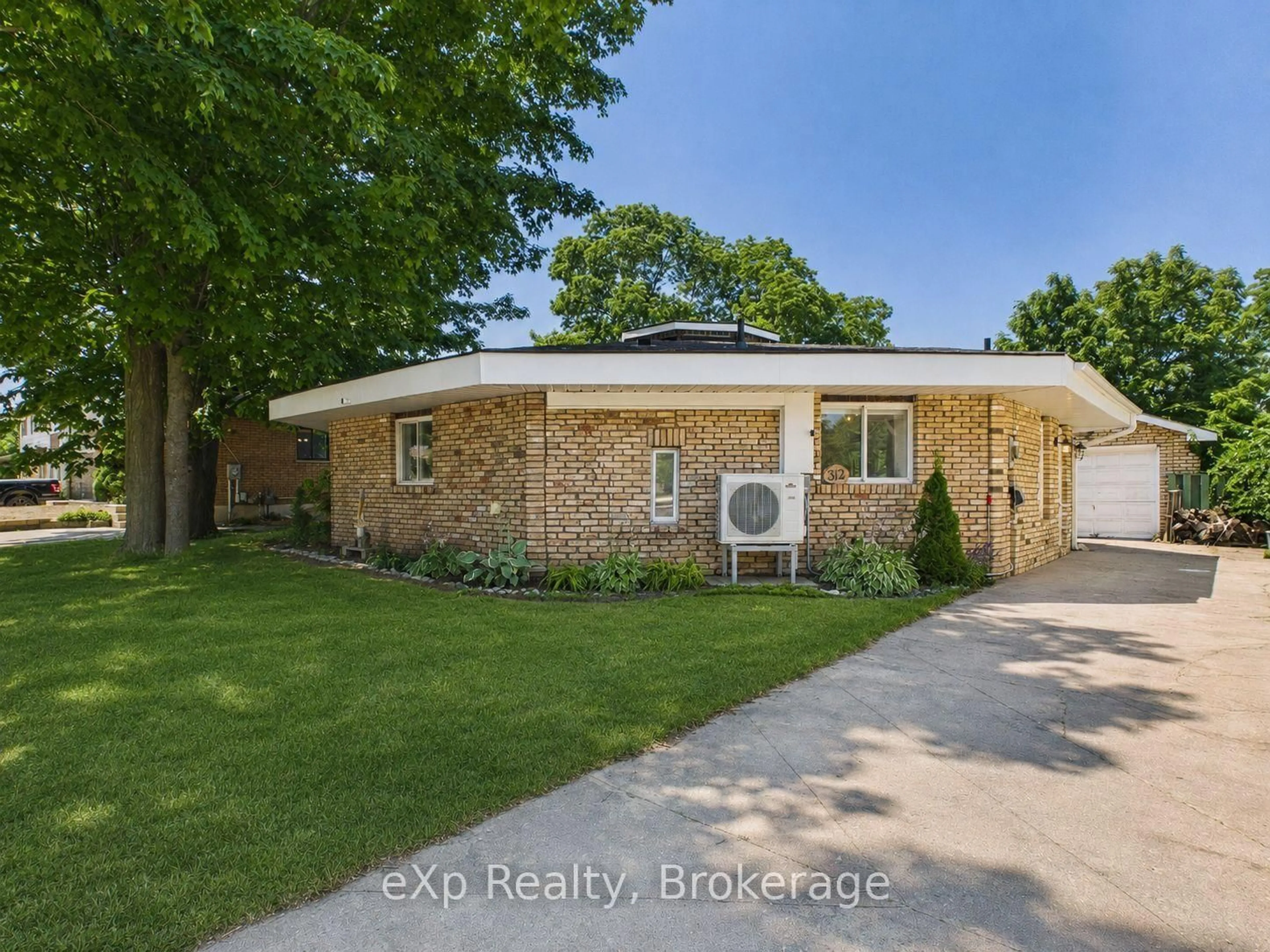 A pic from outside/outdoor area/front of a property/back of a property/a pic from drone, street for 312 Bricker St, Saugeen Shores Ontario N0H 2C1
