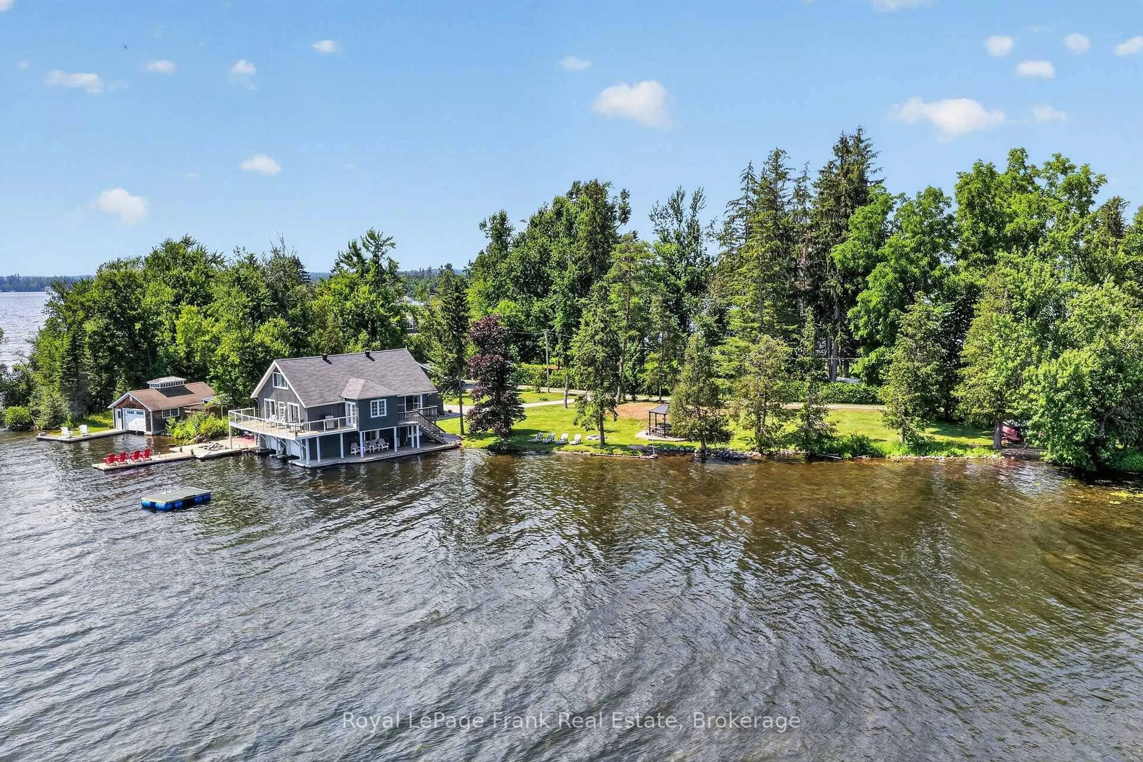 A pic from outside/outdoor area/front of a property/back of a property/a pic from drone, water/lake/river/ocean view for 9 Lilac Lane, Kawartha Lakes Ontario K0M 1L0
