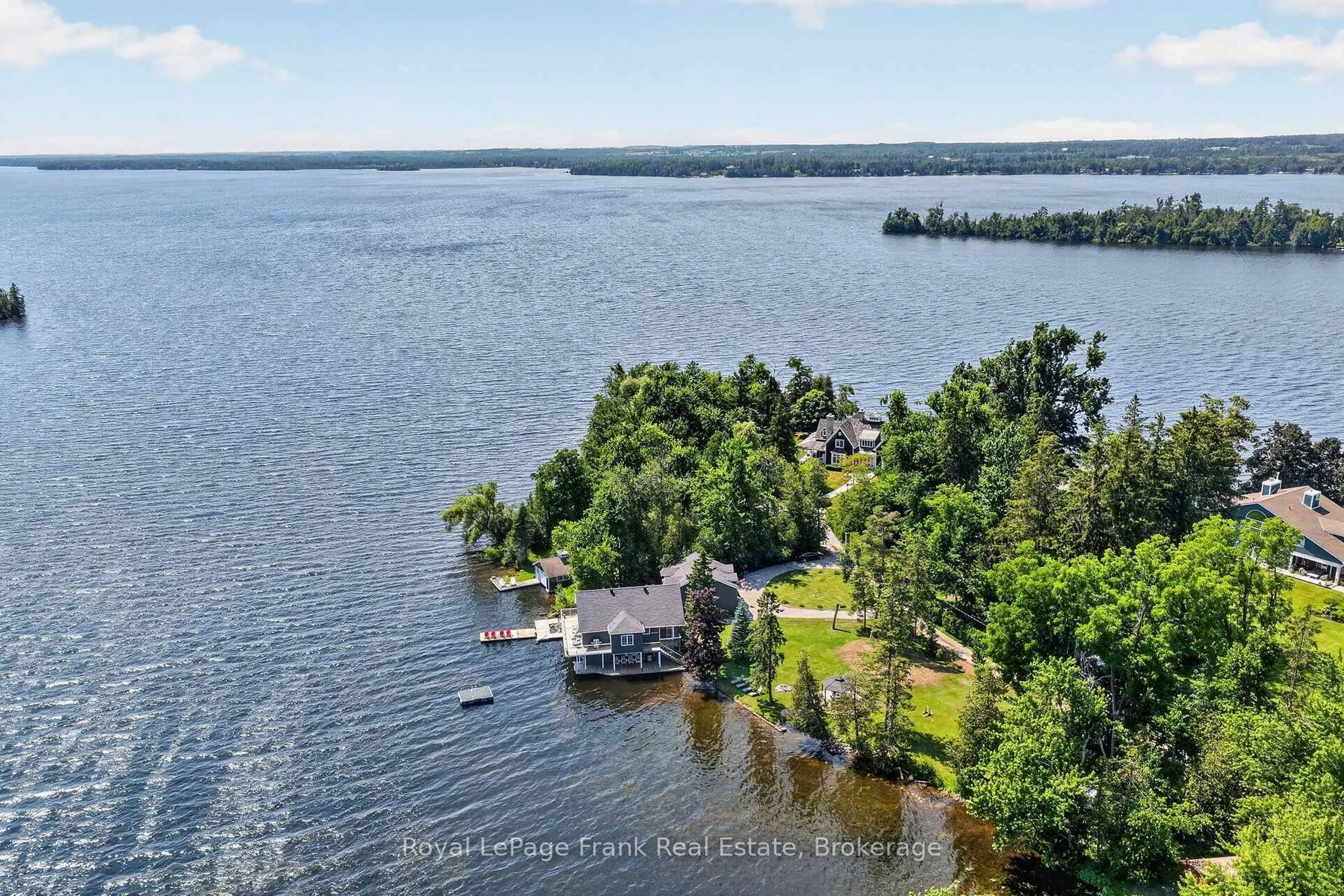 A pic from outside/outdoor area/front of a property/back of a property/a pic from drone, water/lake/river/ocean view for 9 Lilac Lane, Kawartha Lakes Ontario K0M 1L0