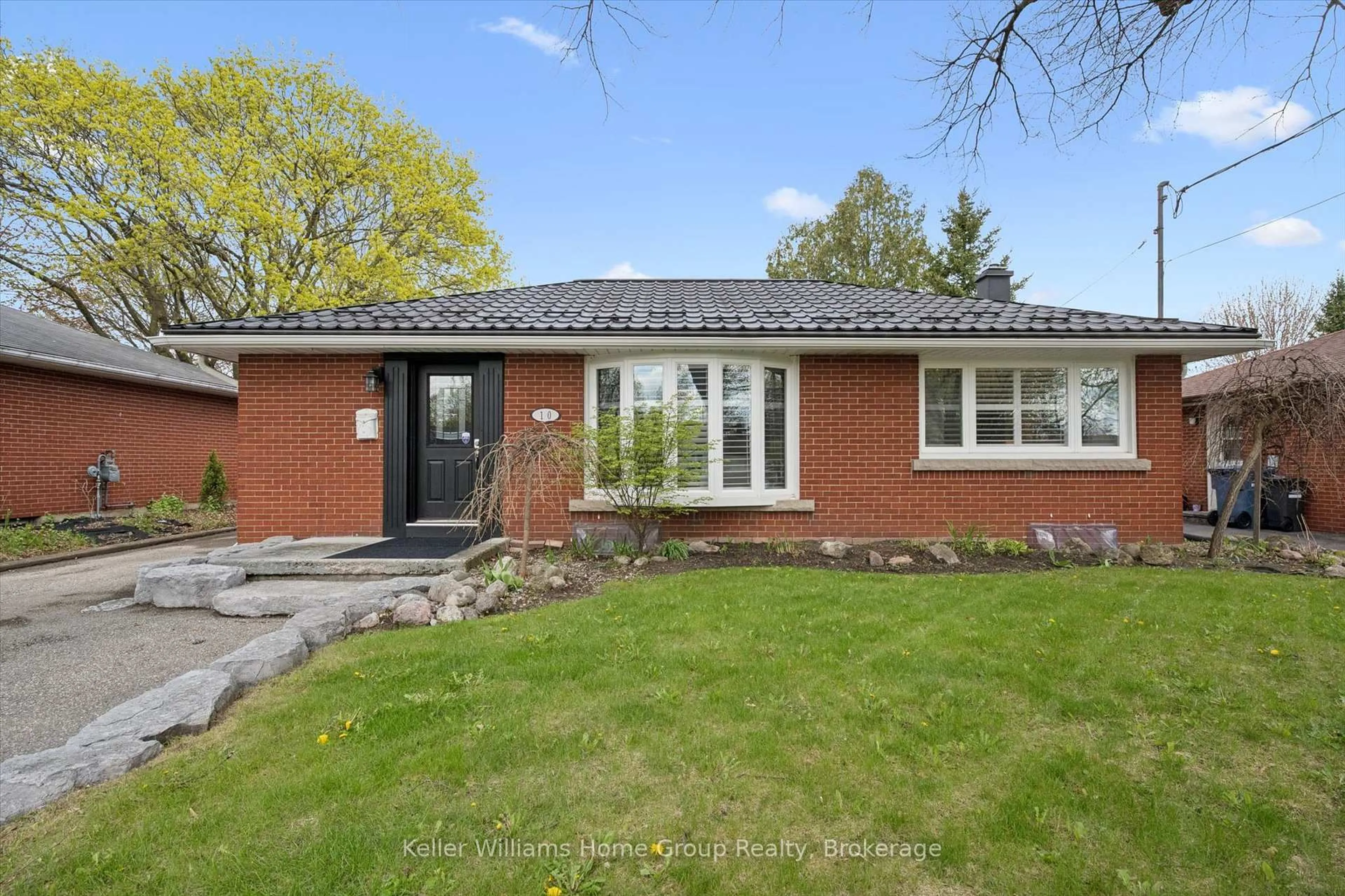 Home with brick exterior material, street for 10 Sumac Pl, Guelph Ontario N1E 1K9