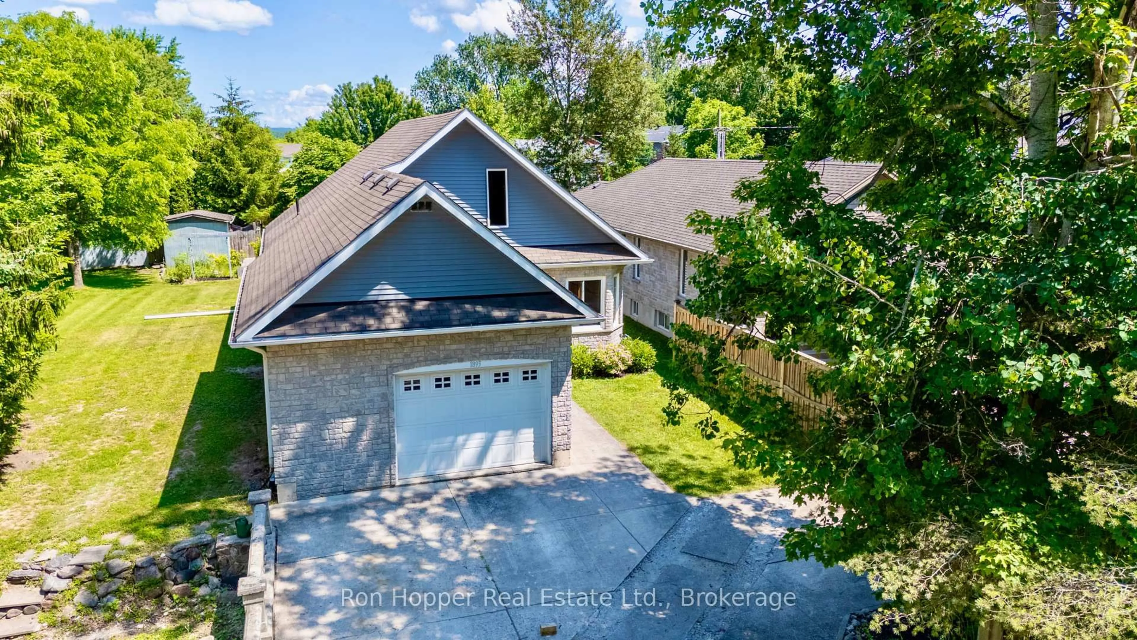 A pic from outside/outdoor area/front of a property/back of a property/a pic from drone, water/lake/river/ocean view for 1893 8th Ave, Owen Sound Ontario N4K 0A7