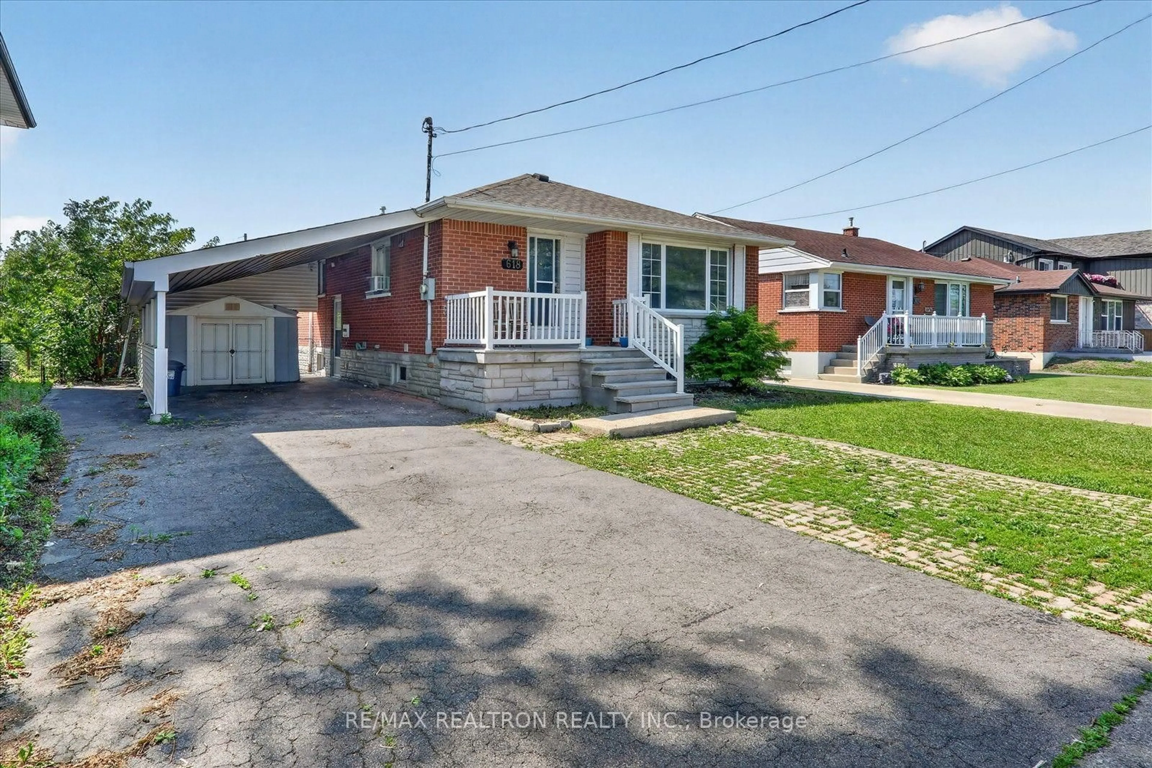 Home with brick exterior material, street for 618 Upper Ottawa St, Hamilton Ontario L8T 3T5