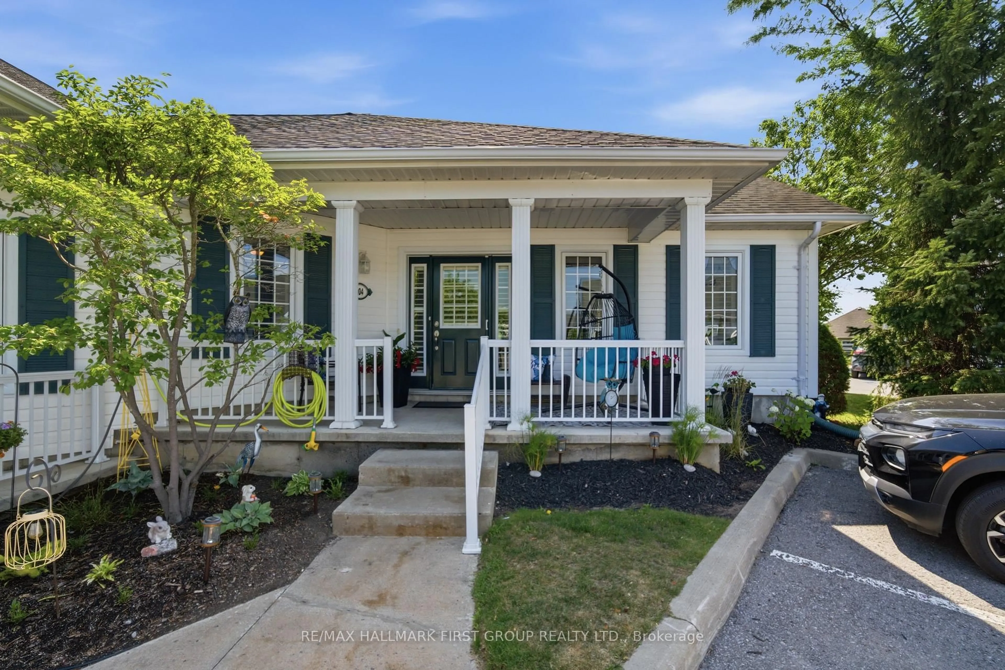 Home with vinyl exterior material, street for 325 Densmore Rd #404, Cobourg Ontario K9A 0E4