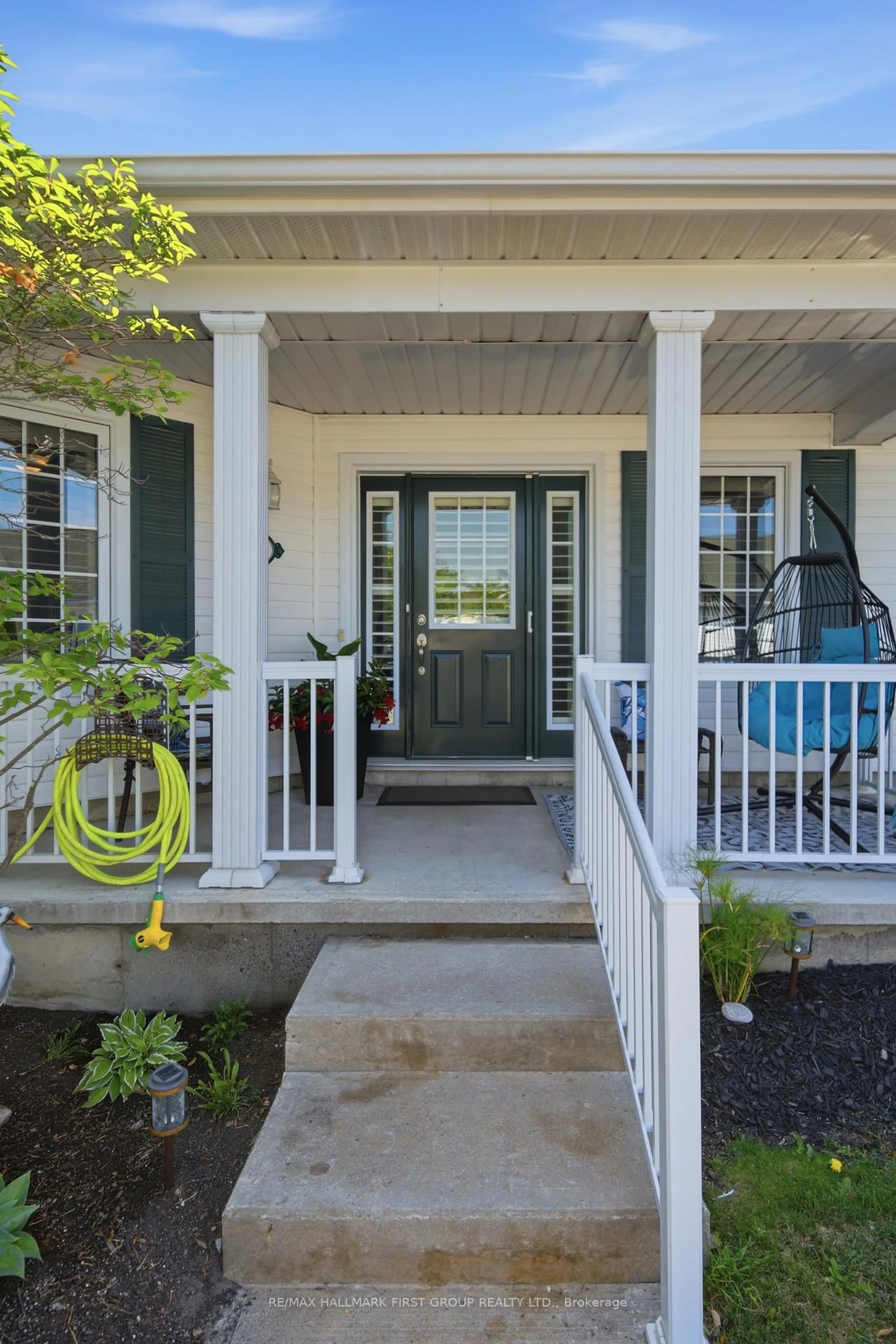 Home with vinyl exterior material, street for 325 Densmore Rd #404, Cobourg Ontario K9A 0E4