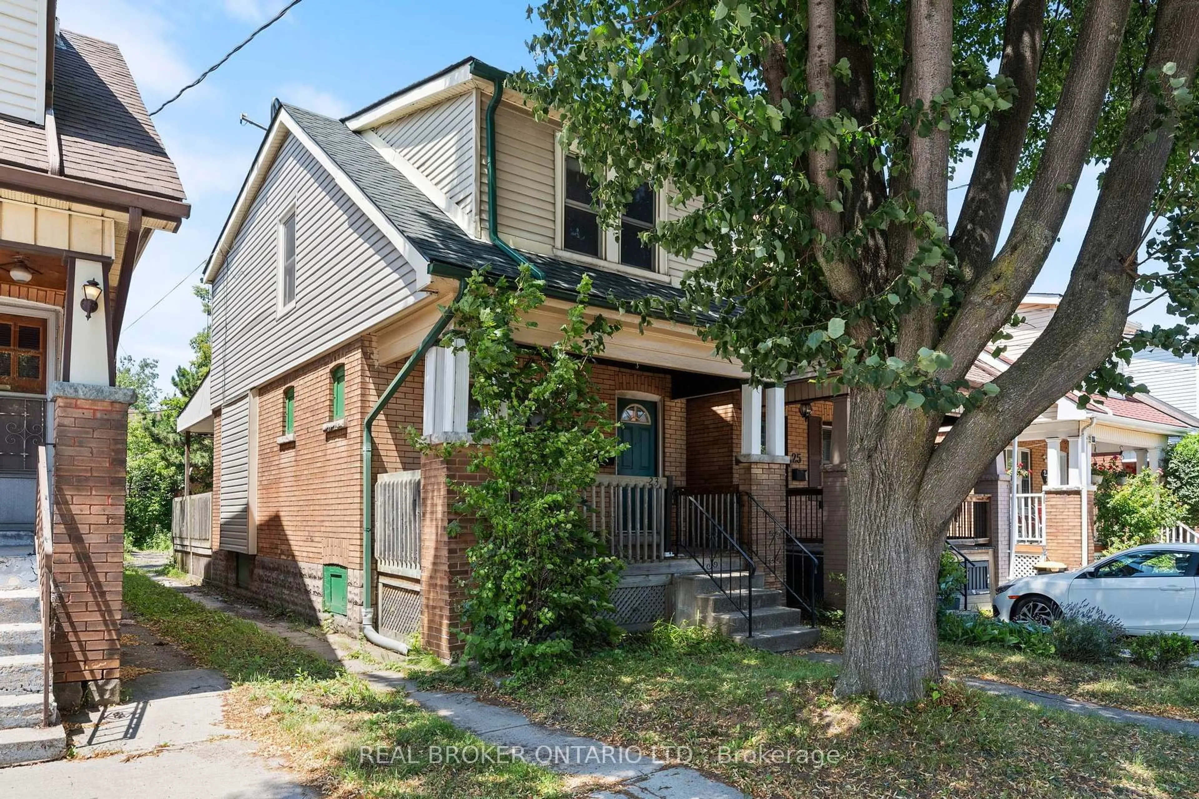 Home with brick exterior material, street for 23 Edgemont St, Hamilton Ontario L8H 4C7
