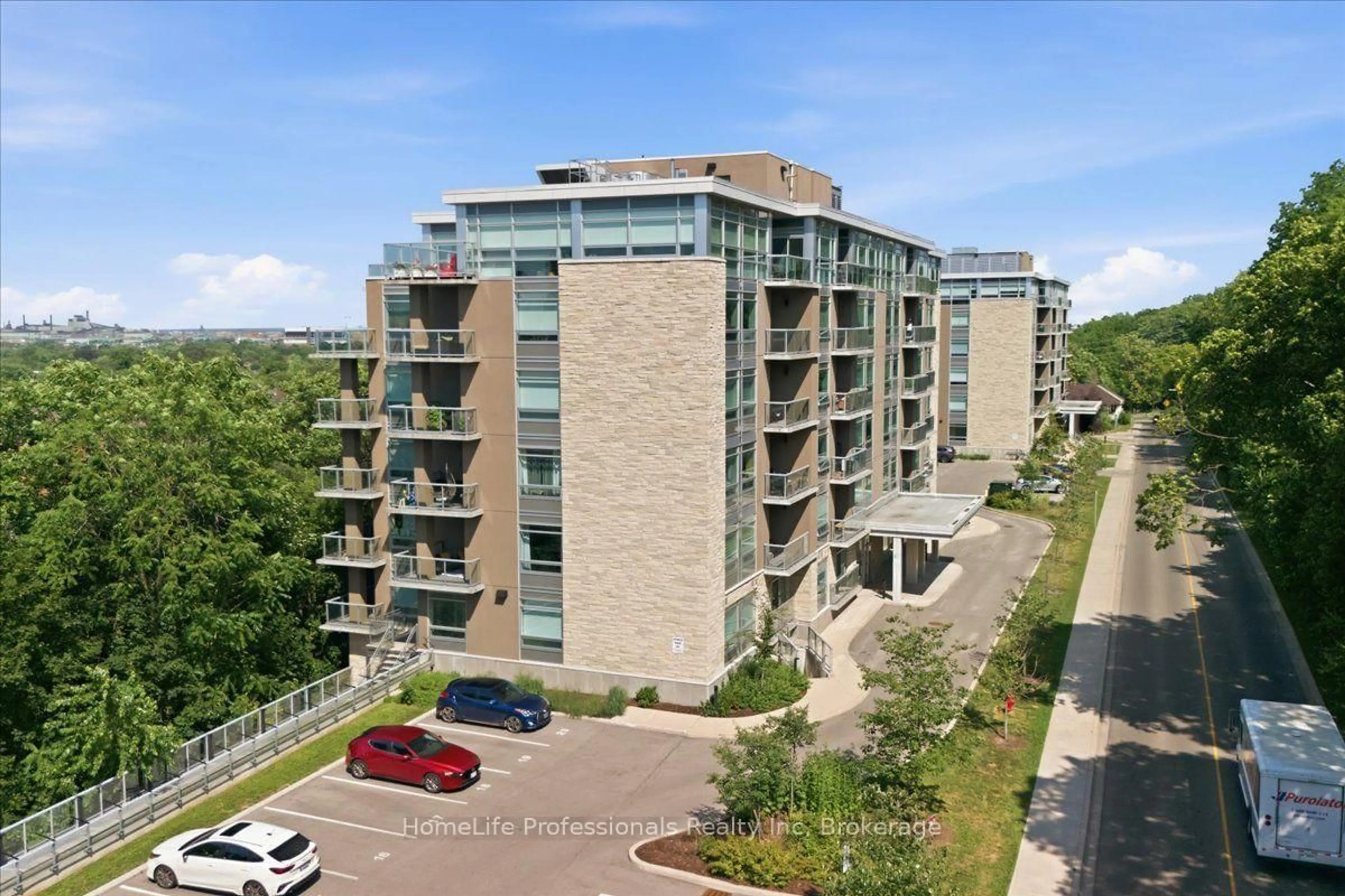 A pic from outside/outdoor area/front of a property/back of a property/a pic from drone, city buildings view from balcony for 467 Charlton Ave #203, Hamilton Ontario L8N 0B3