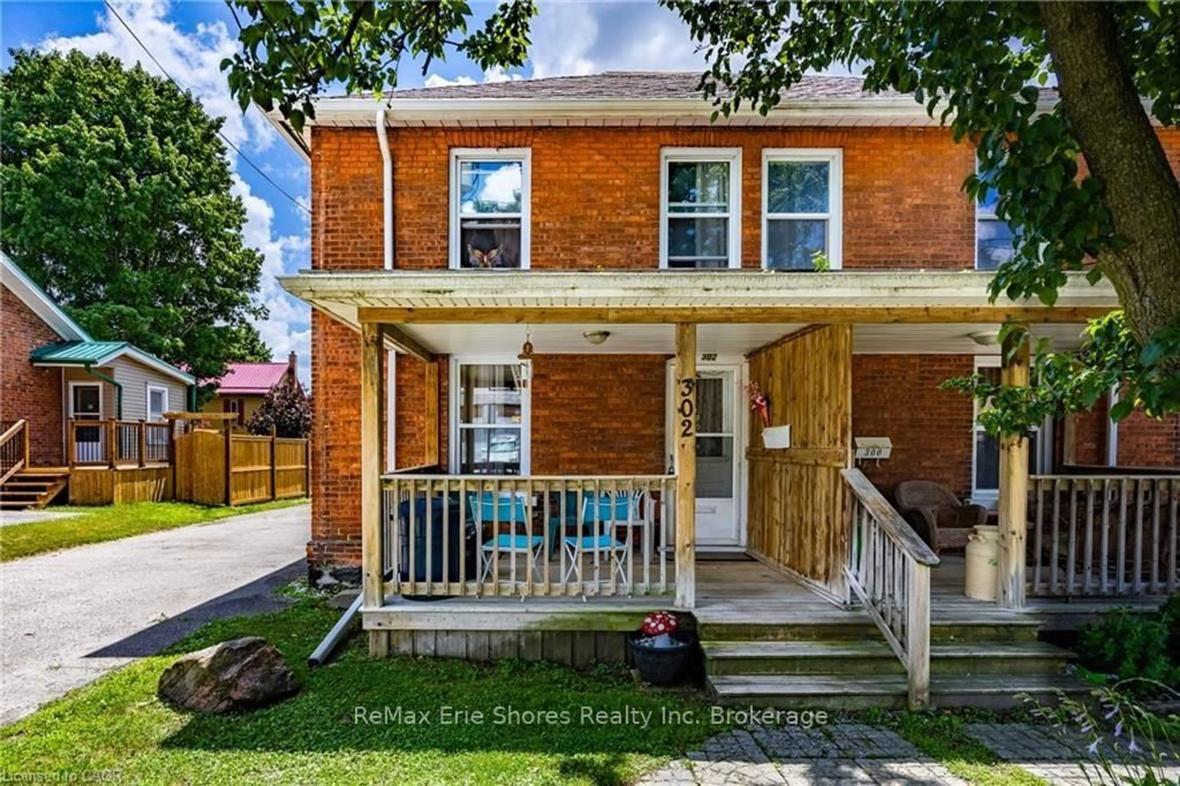 Home with brick exterior material, street for 302 Simcoe St, Woodstock Ontario N4S 1H9