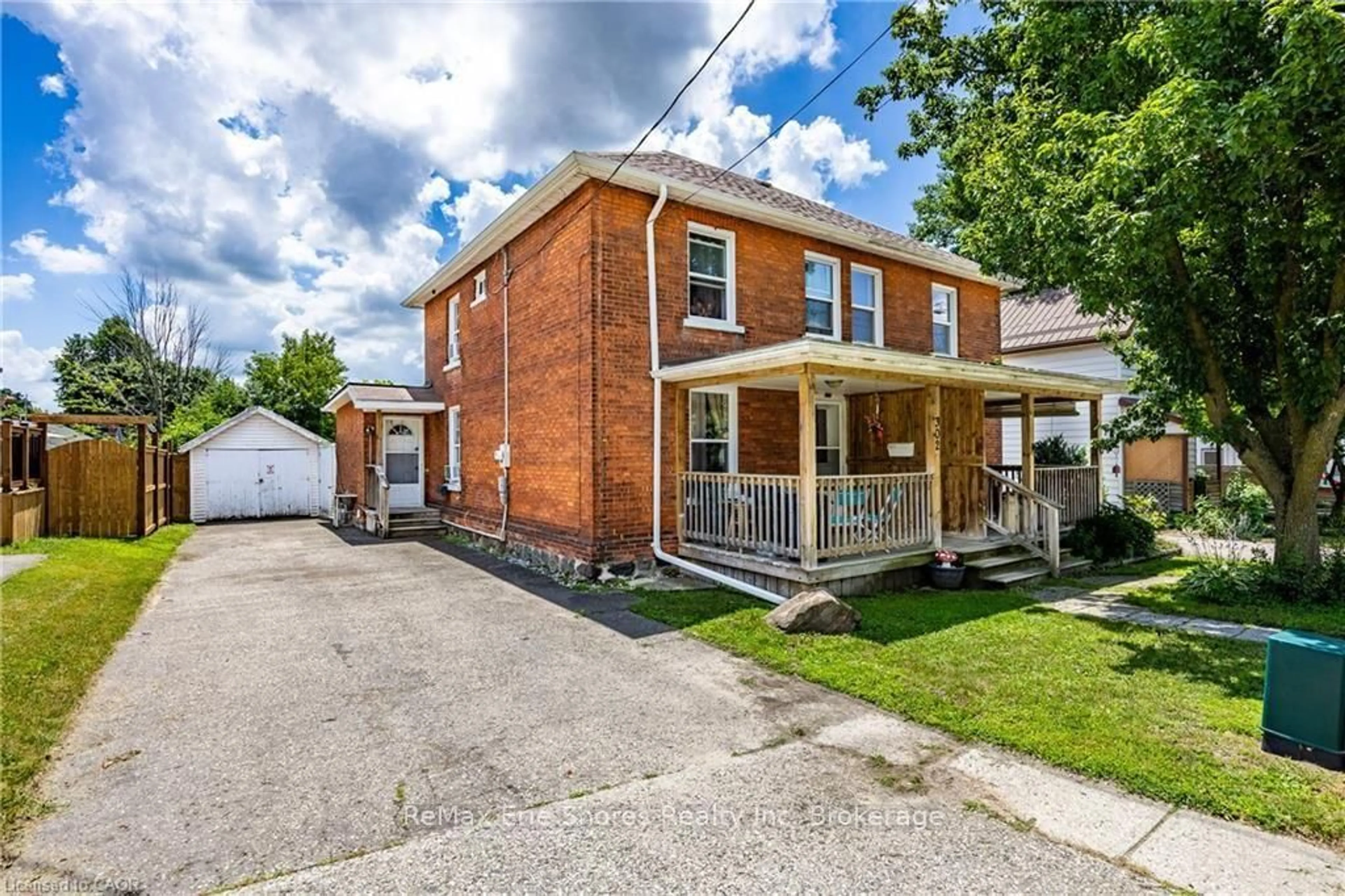 Home with brick exterior material, street for 302 Simcoe St, Woodstock Ontario N4S 1H9