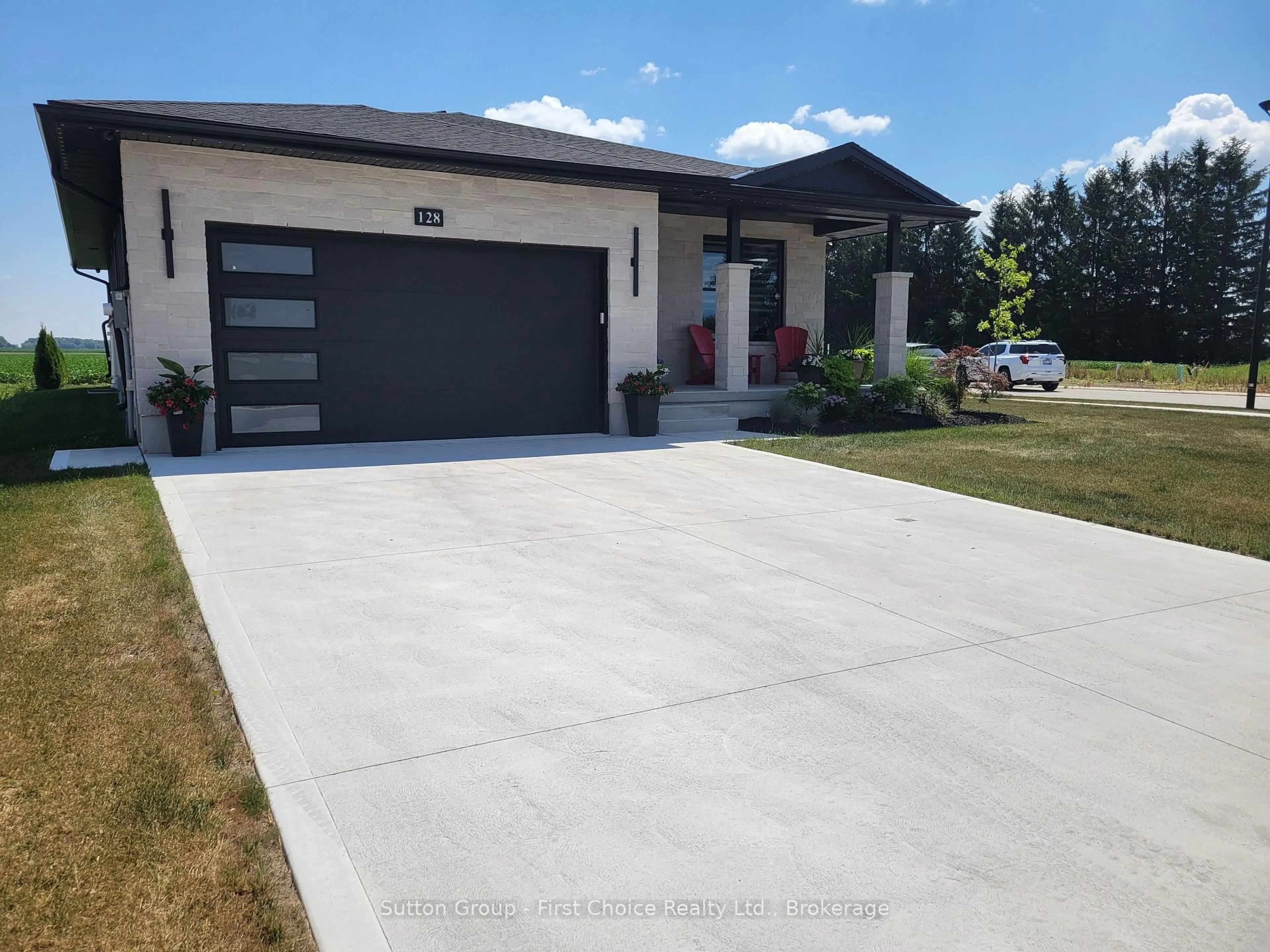Home with vinyl exterior material, street for 128 Rowe Ave, South Huron Ontario N0M 1S1